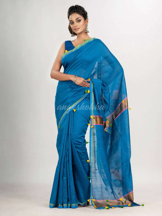 Aqua blue cotton blend with pompom handloom saree