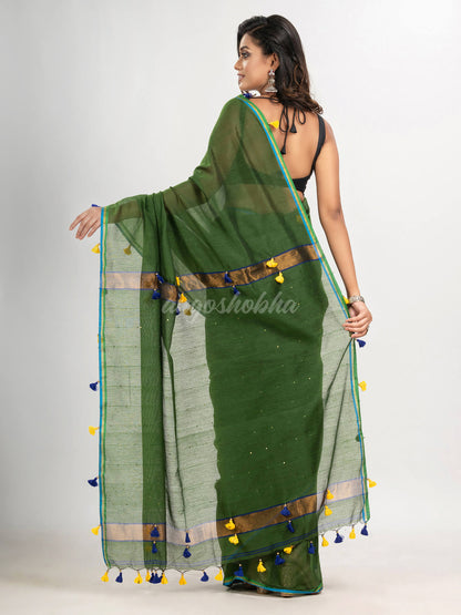 Hunter green cotton blend with pompom handloom saree