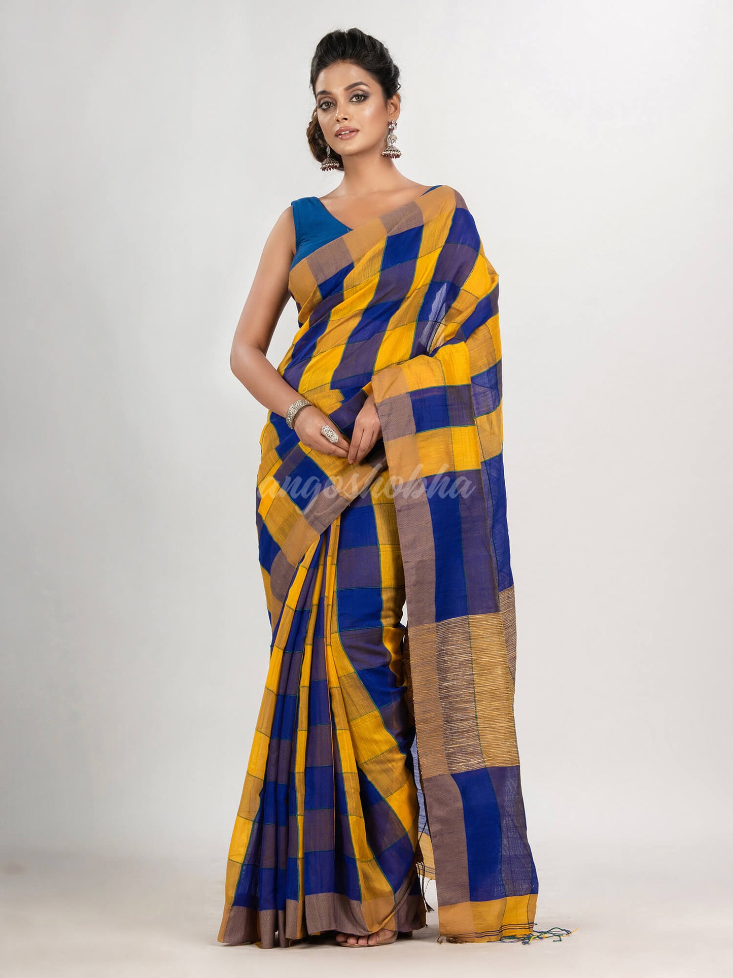 Yellow & Blue cotton blend all body check handloom saree