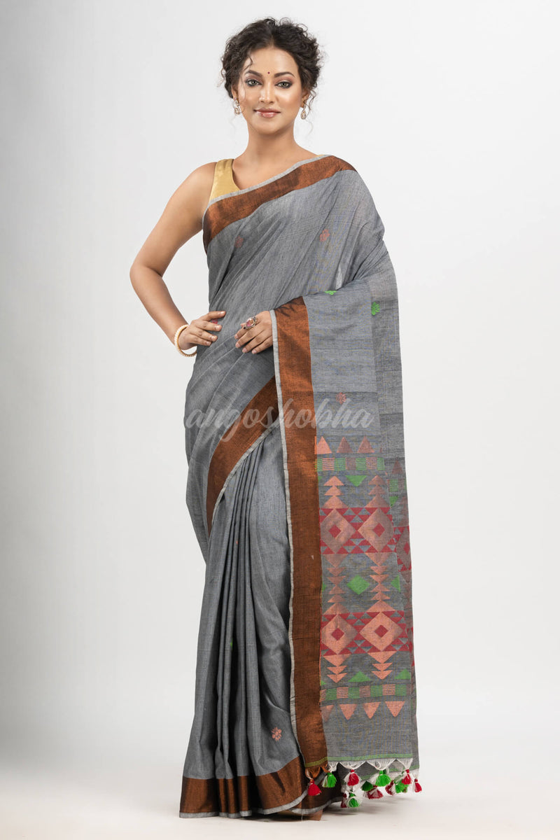 Grey cotton all body buti with diamond pallu and copper zari broder handloom jacquard saree