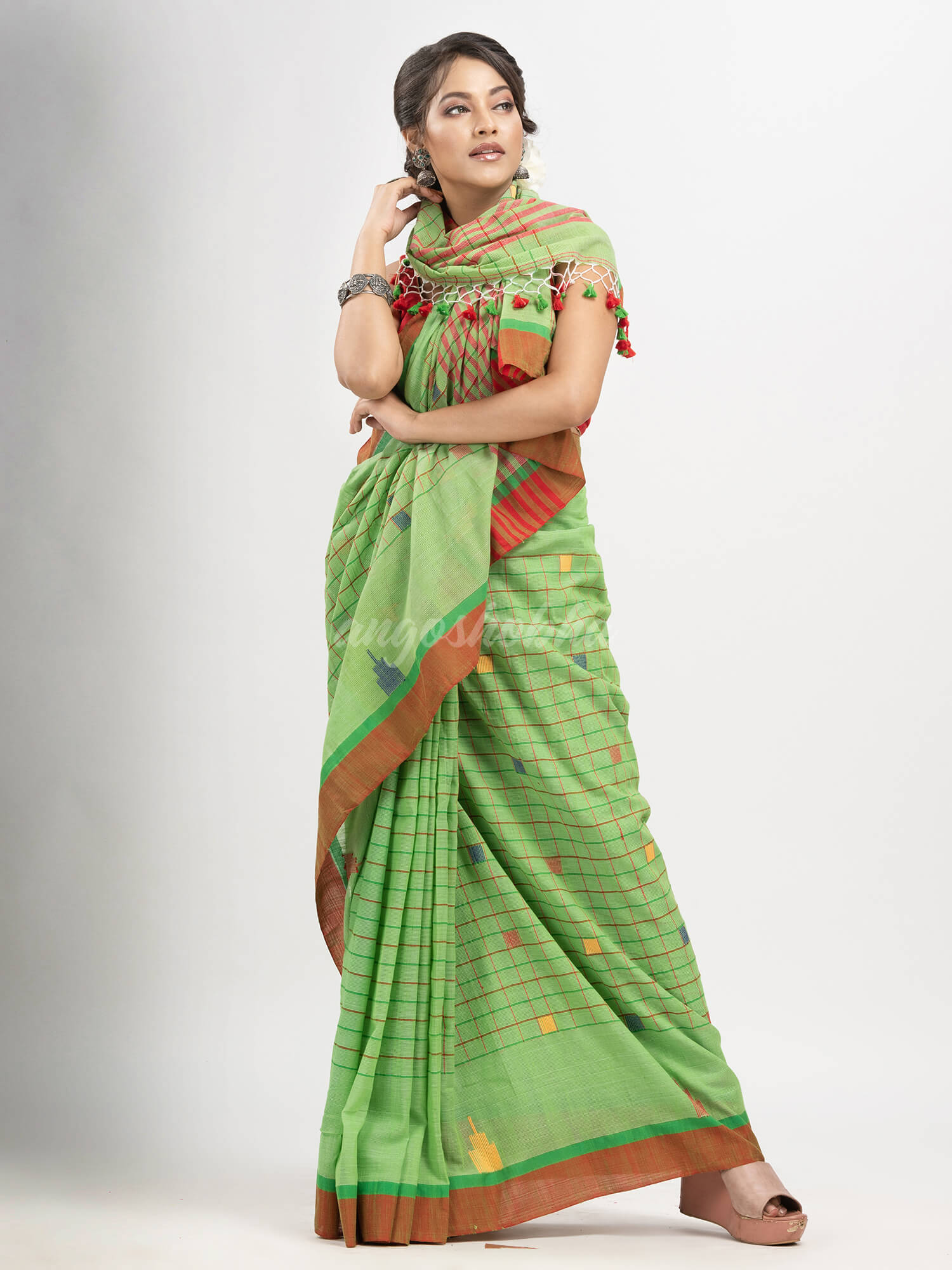 Lime Green cotton all body check and buti with pallu buti in solid broder handloom saree