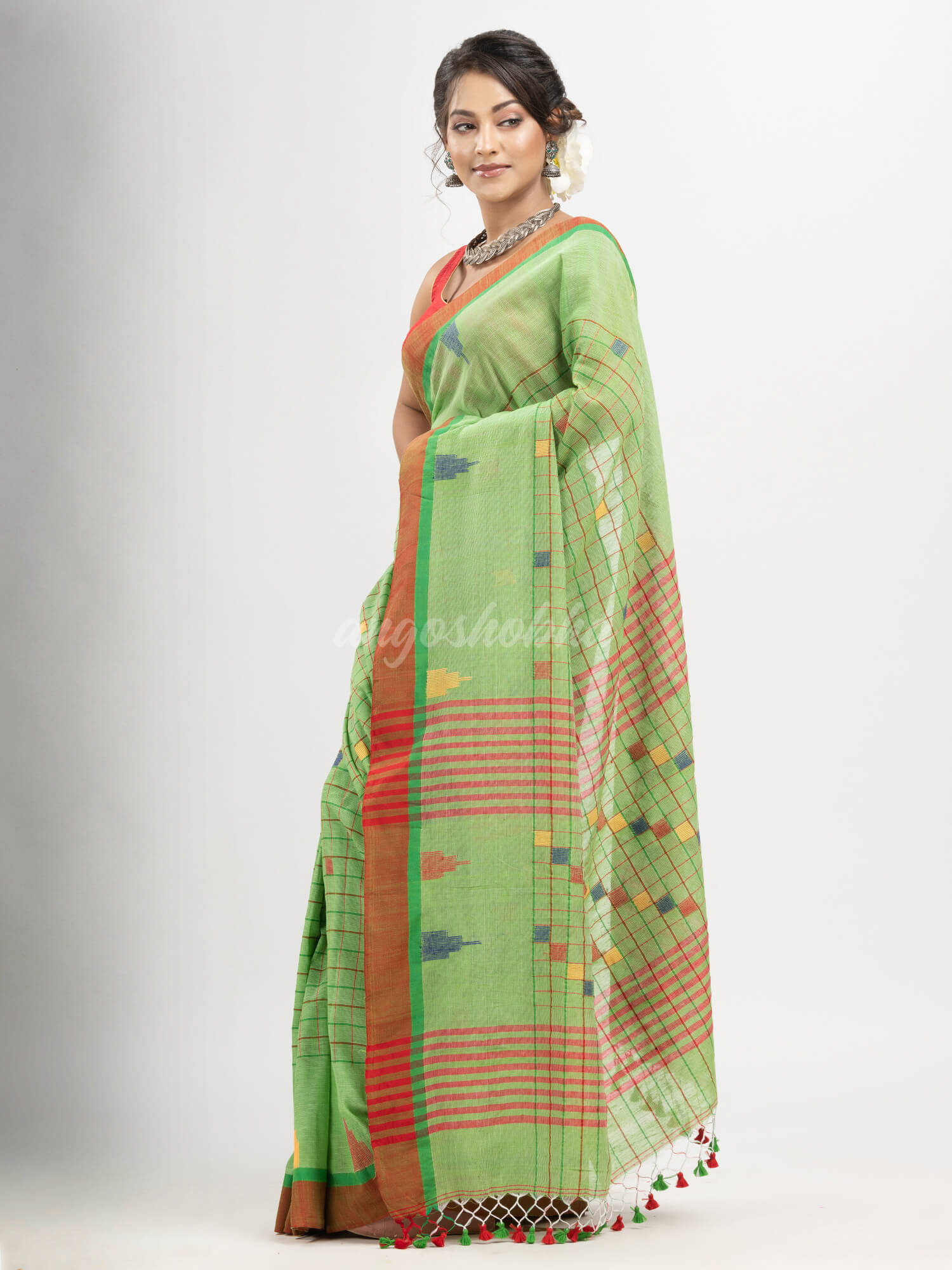 Lime Green cotton all body check and buti with pallu buti in solid broder handloom saree