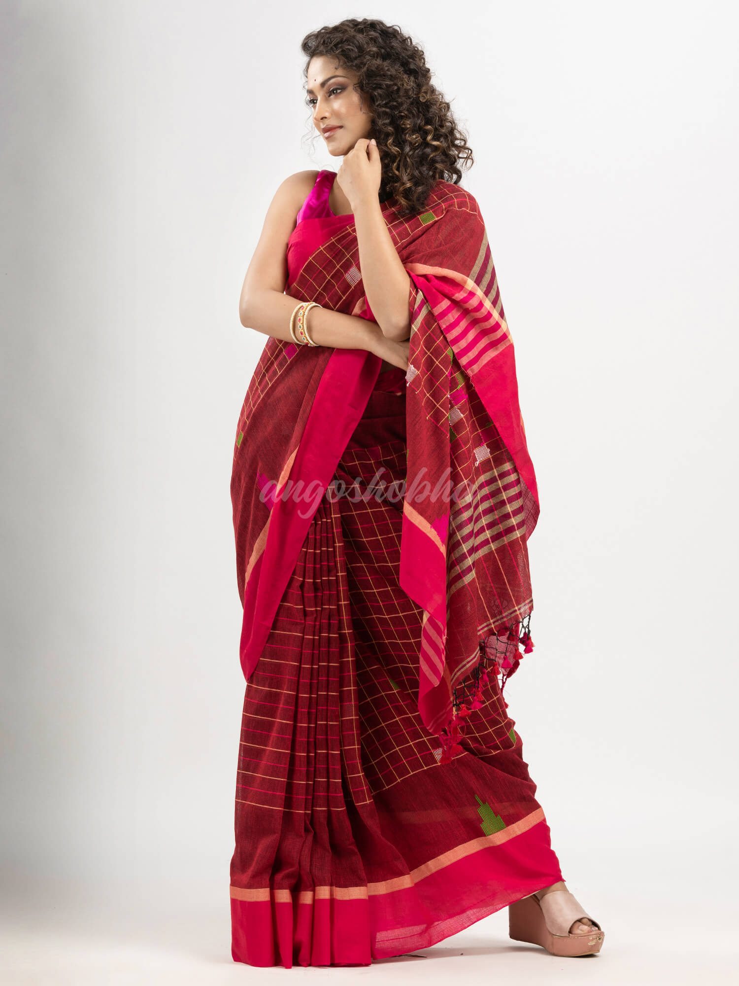 Red cotton all body check and buti with pallu buti in solid broder handloom saree