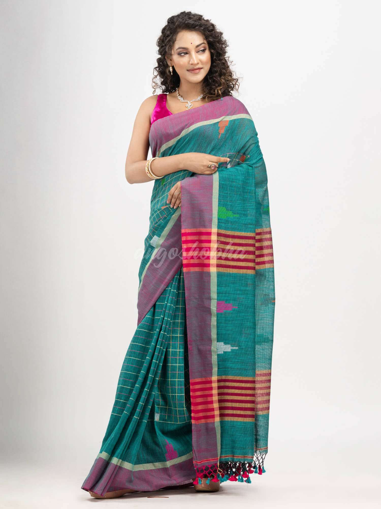 Teal cotton all body check and buti with pallu buti in solid broder handloom saree