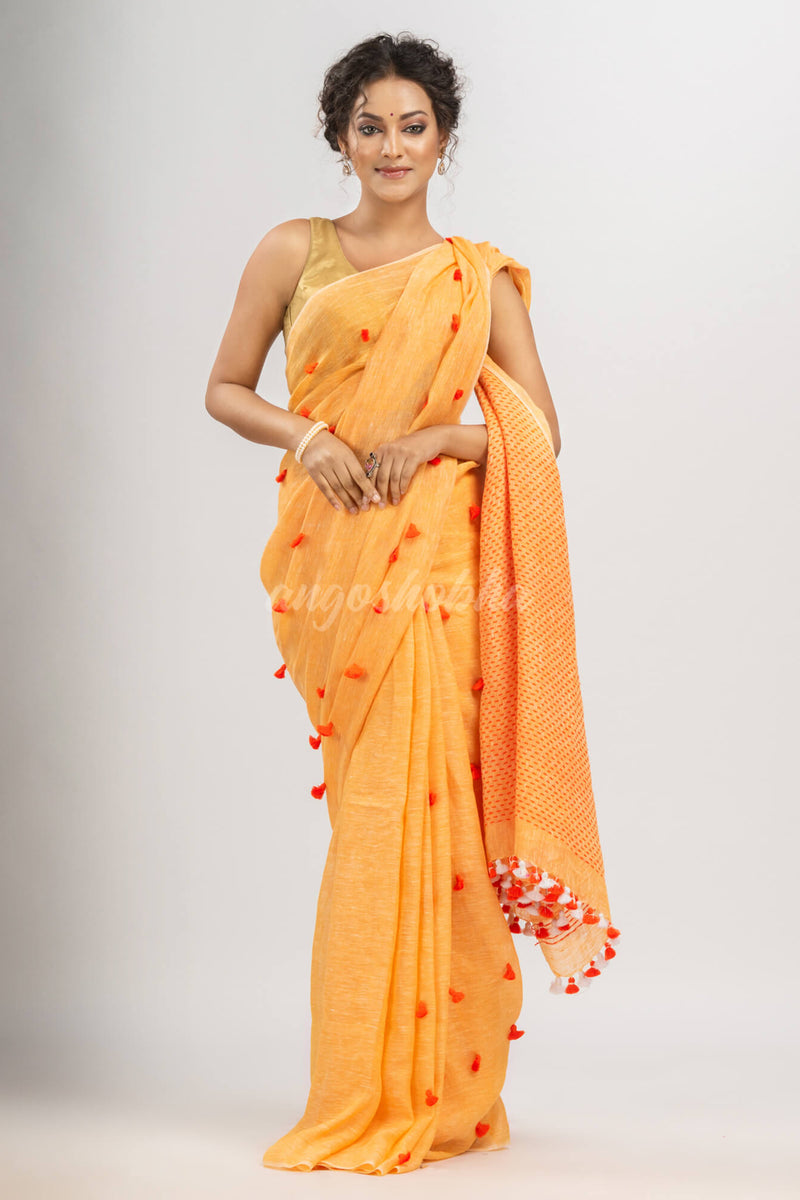 Orange linen all body pom pom with pallu stipe handwoven saree