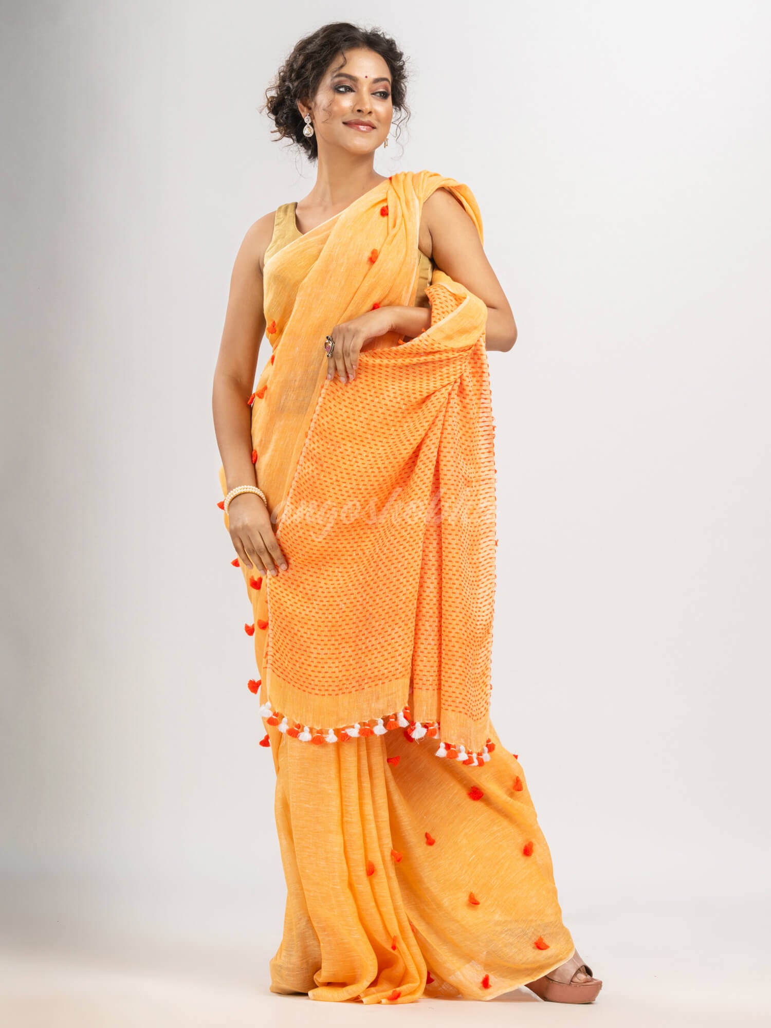 Orange linen all body pom pom with pallu stipe handwoven saree