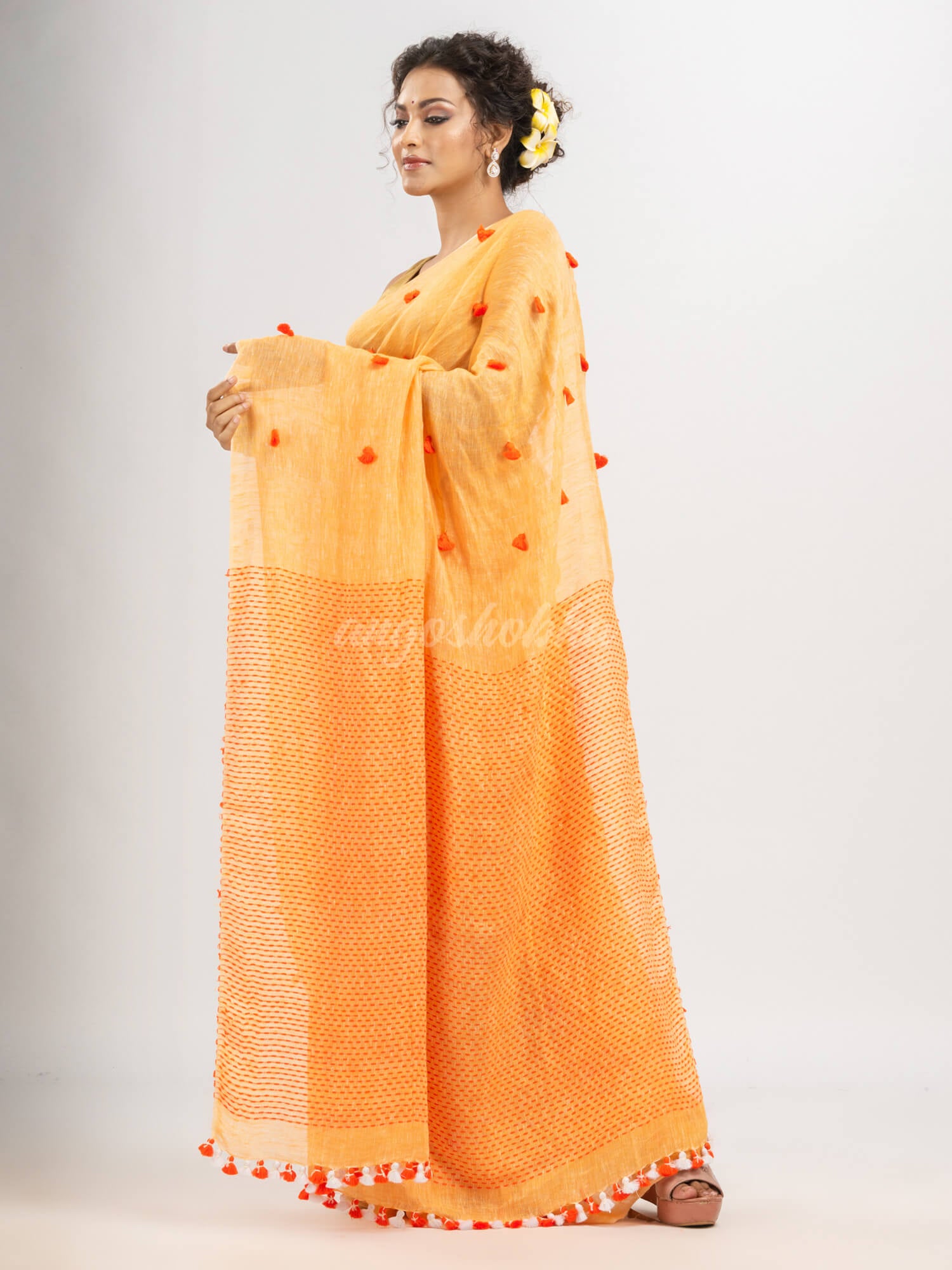 Orange linen all body pom pom with pallu stipe handwoven saree