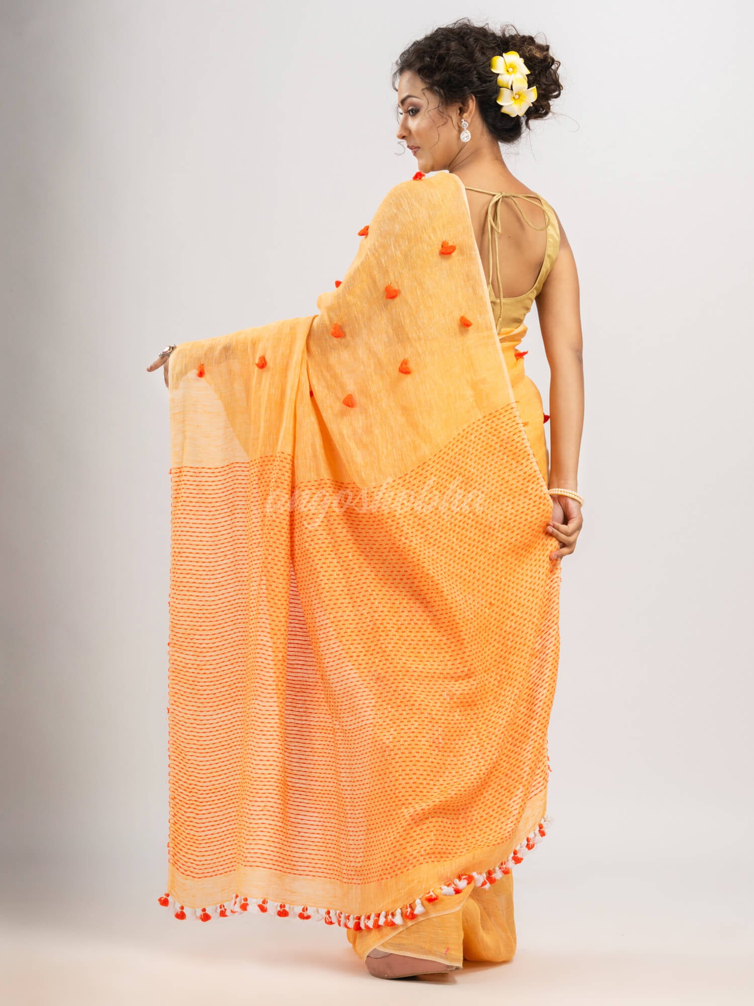 Orange linen all body pom pom with pallu stipe handwoven saree