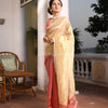 This is Dark Peach Linen Silver Zari Check Pallu Handwoven tissue saree