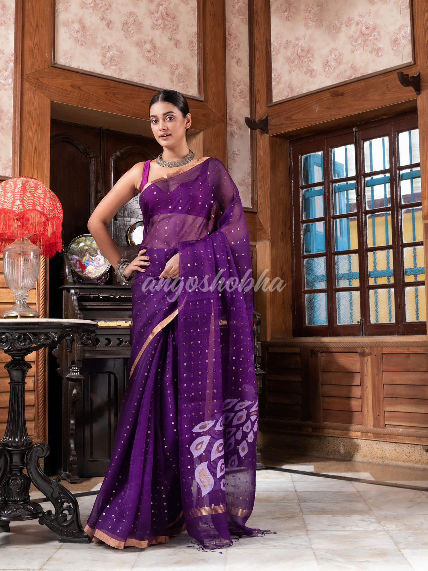 This jamdani silk saree from Angoshobha is a beautiful Purple Silk Handloom saree