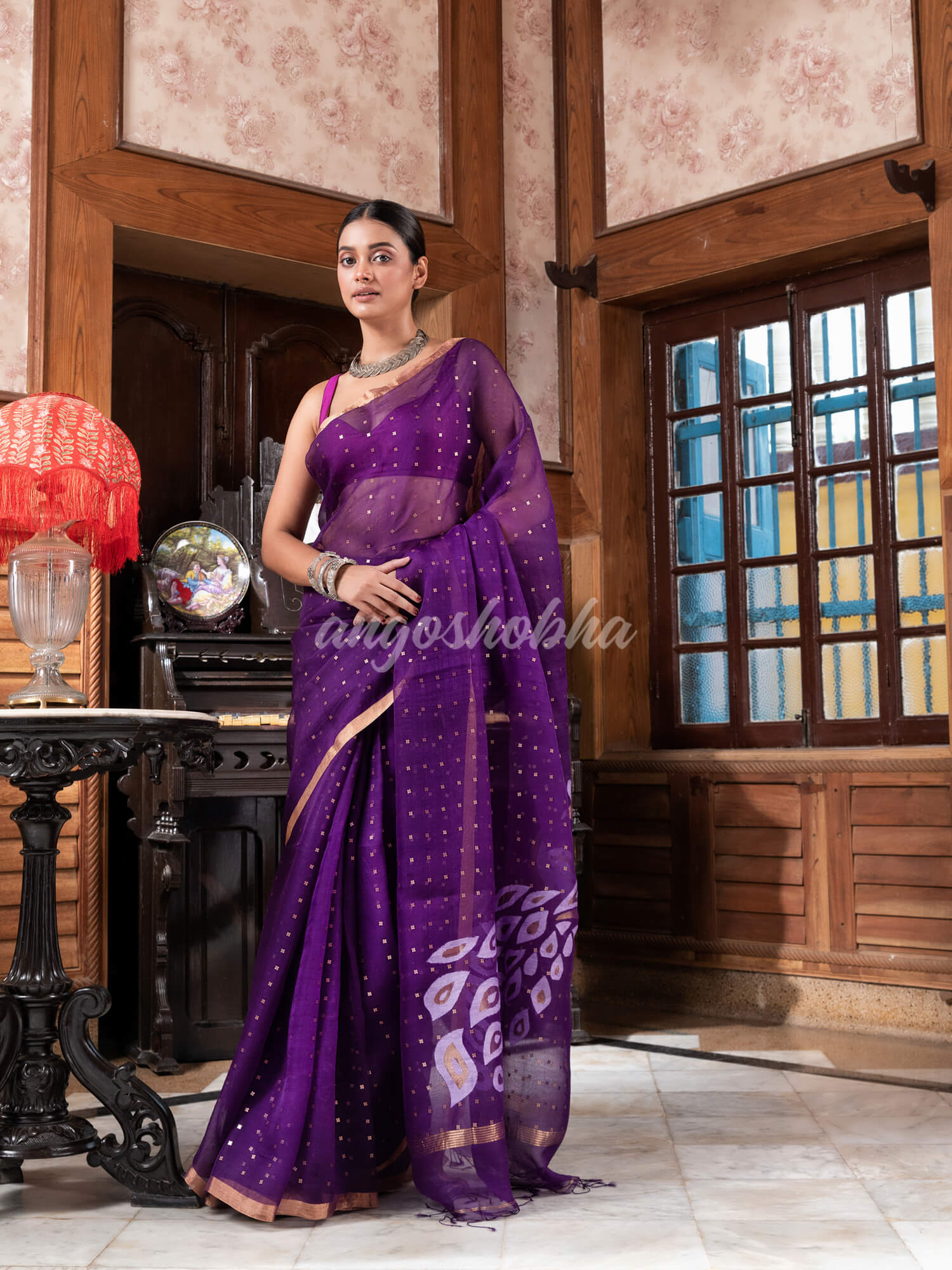 This jamdani silk saree from Angoshobha is a beautiful Purple Silk Handloom saree