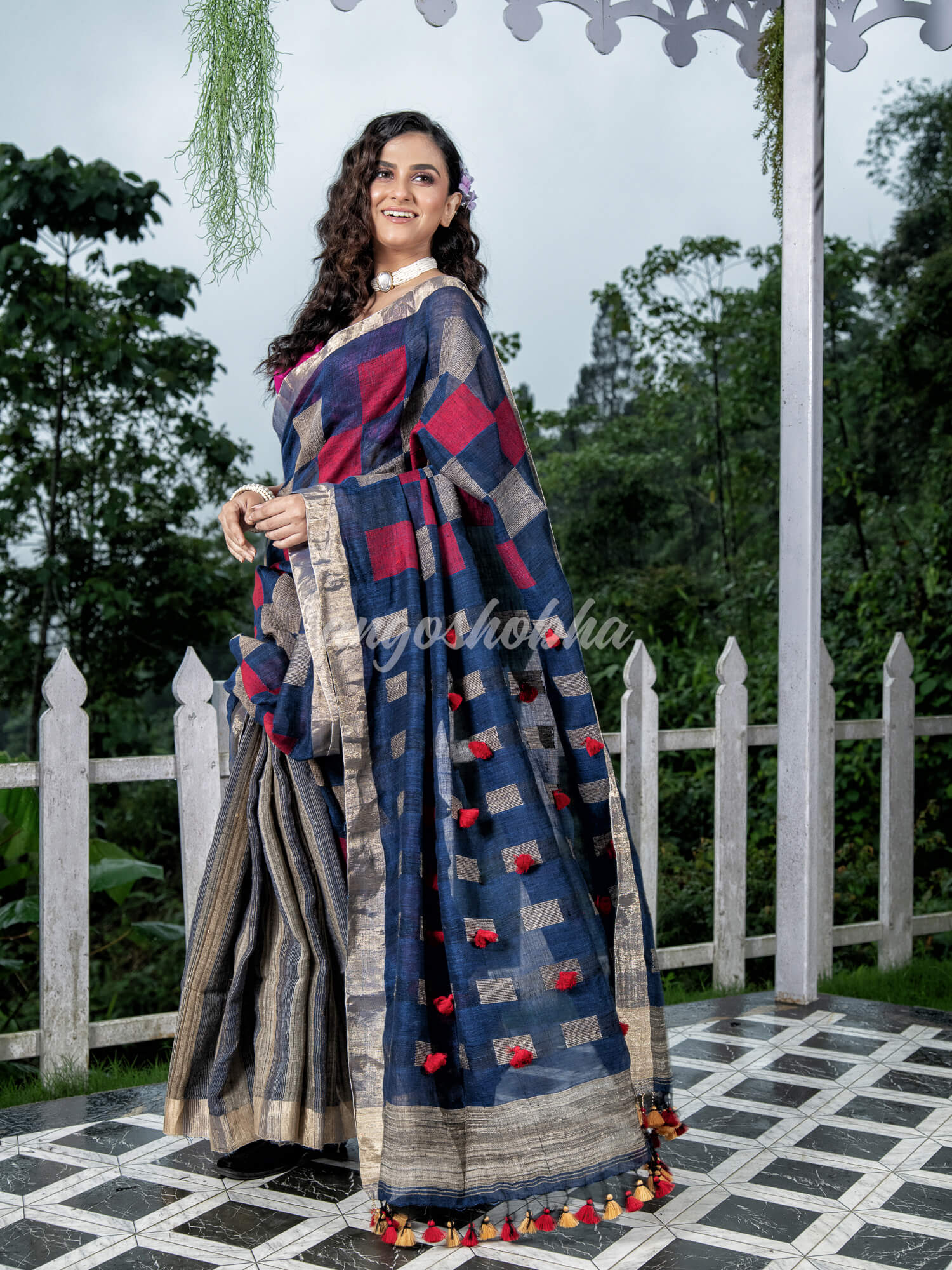 Blue Linen Body with Red & Beige Box Design Bronze Border Multi Color Tassels Pallu Handwoven Saree