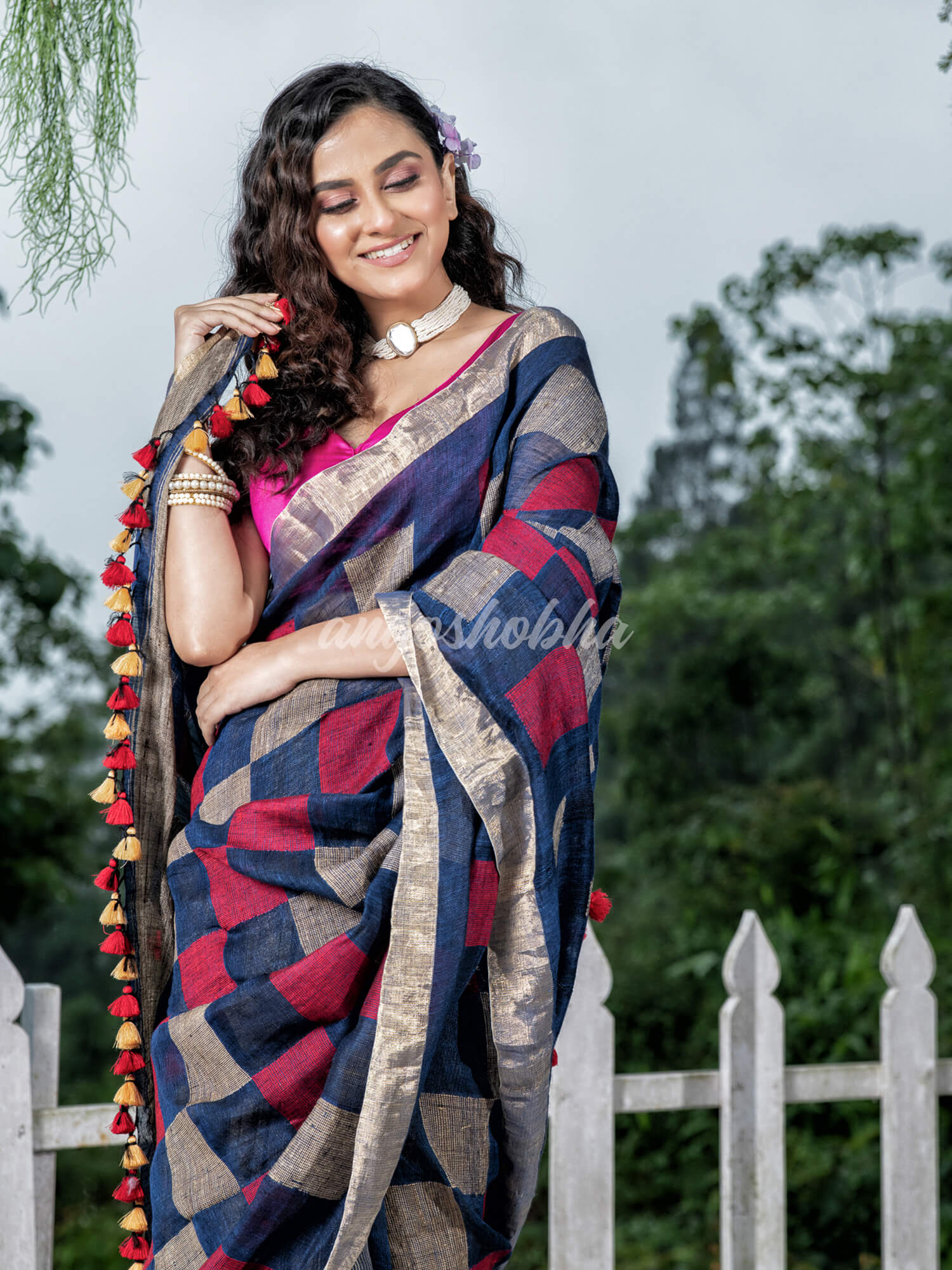 Blue Linen Body with Red & Beige Box Design Bronze Border Multi Color Tassels Pallu Handwoven Saree