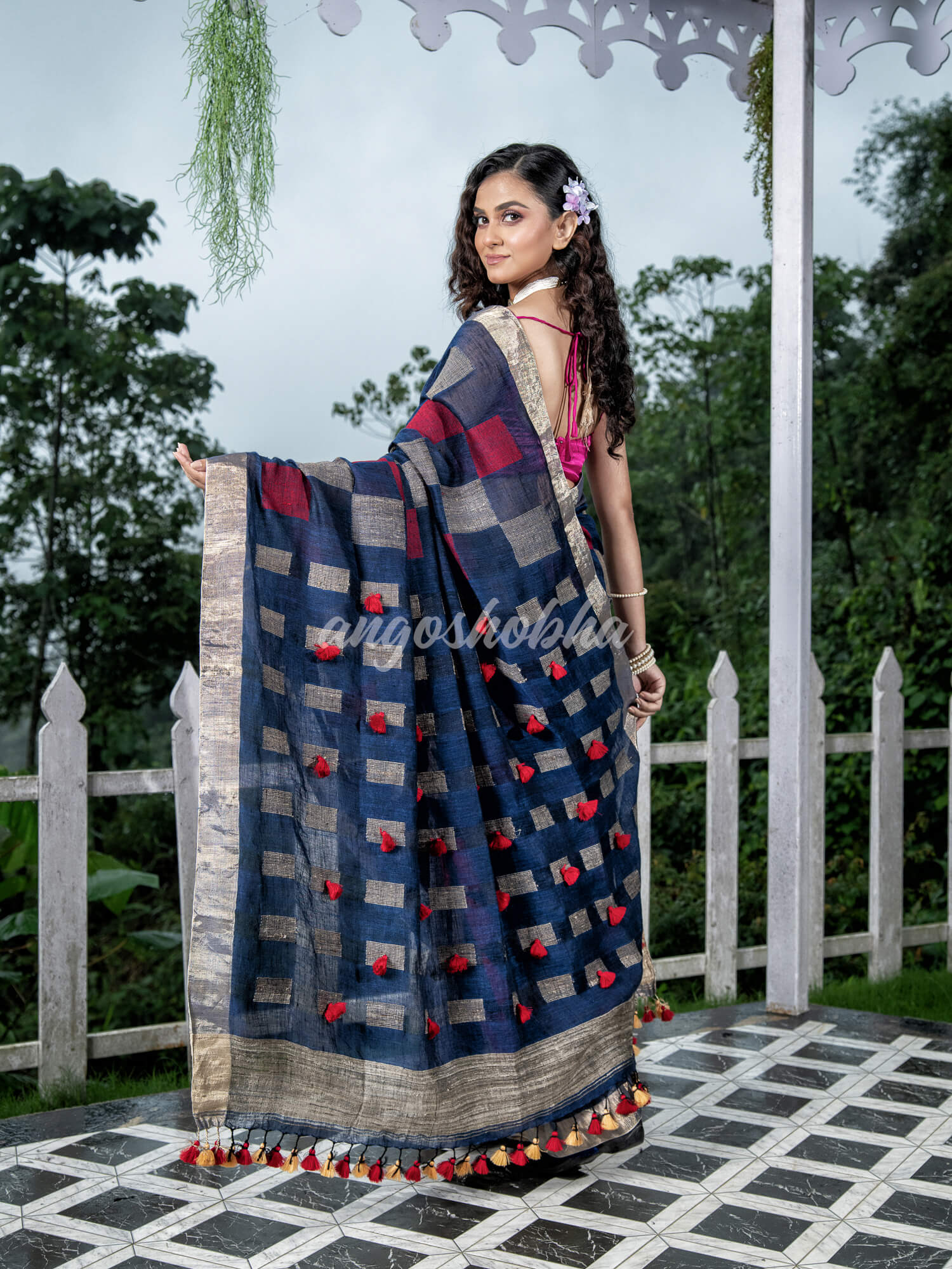 Blue Linen Body with Red & Beige Box Design Bronze Border Multi Color Tassels Pallu Handwoven Saree