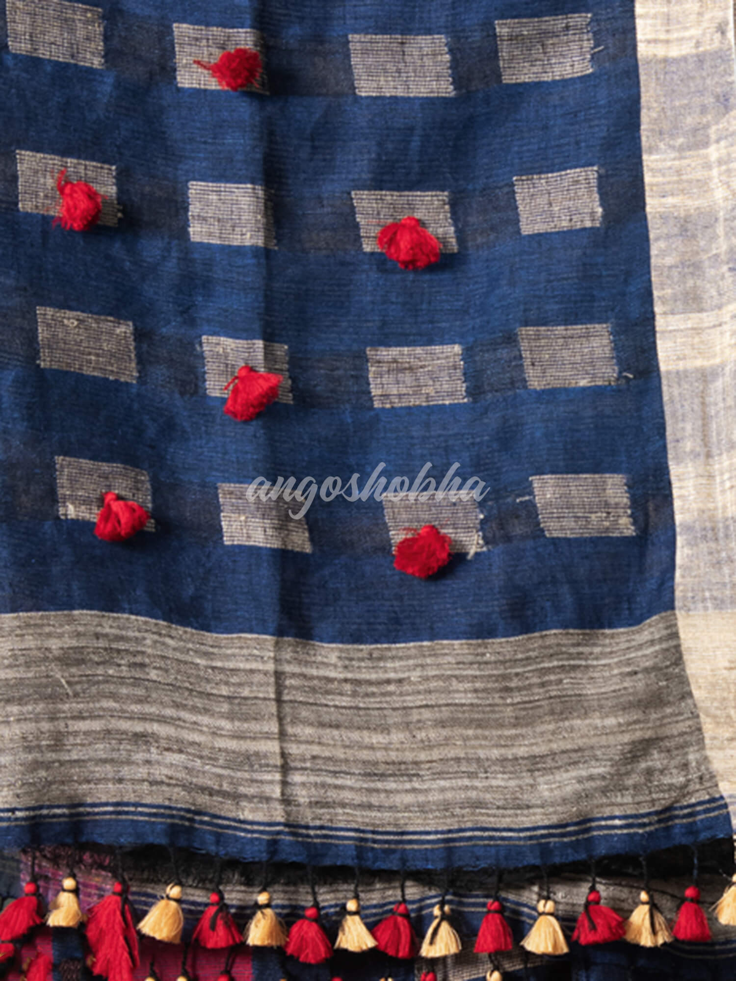 Blue Linen Body with Red & Beige Box Design Bronze Border Multi Color Tassels Pallu Handwoven Saree