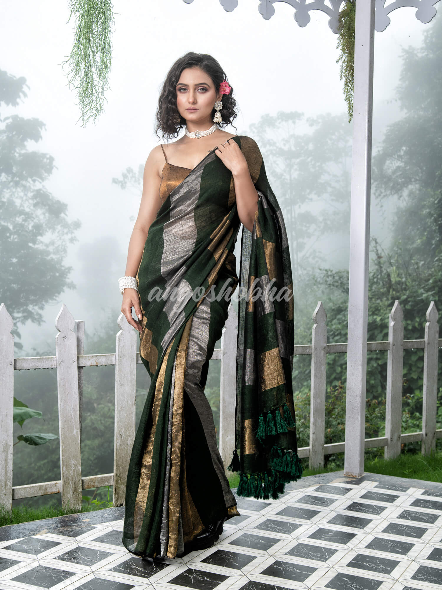 Bottle Green Linen Multicolor Tissue Body with Bottle Green Tassels Handwoven Saree