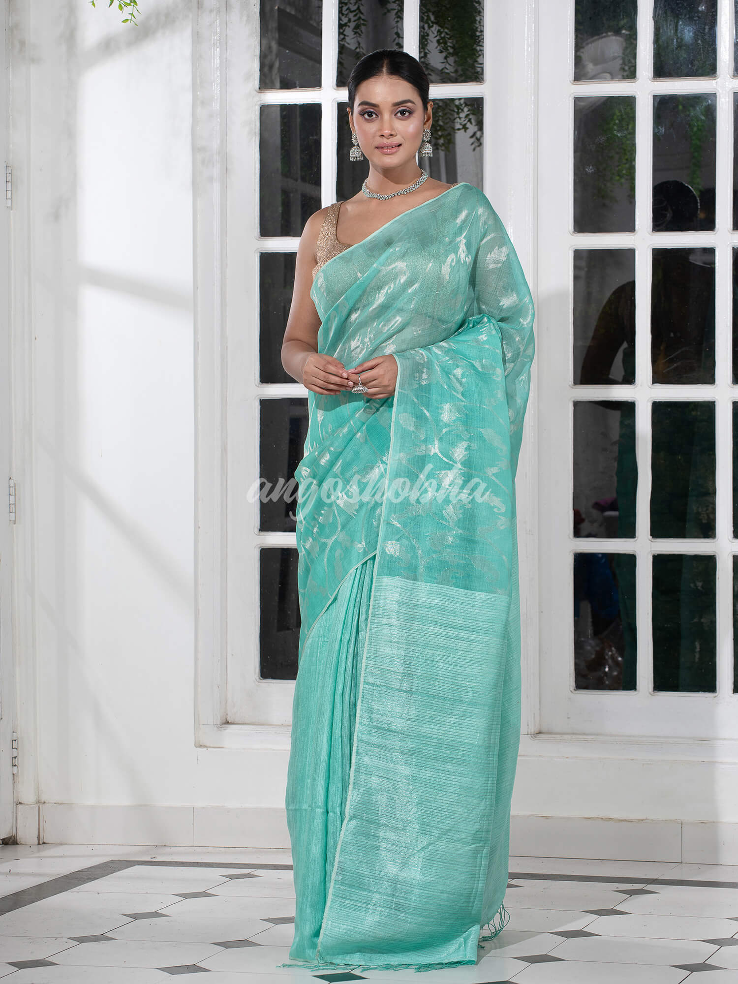 Aqua Silk Matka Body Creeper Design all over Silver Zari Check Pallu Handwoven Saree