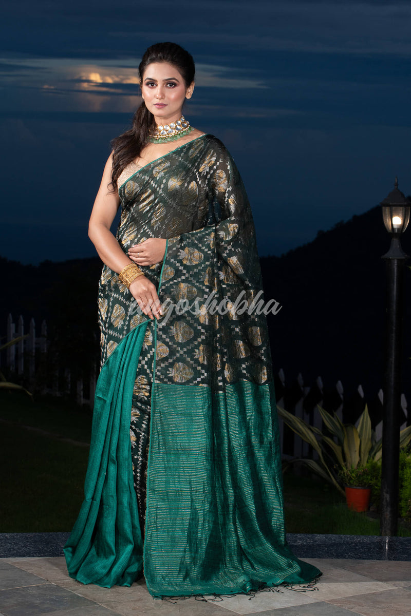 Dark Green Silk Matka Body with Leaves Intricate Design including Silver & Golden Stripes on Check Pallu Handwoven Saree