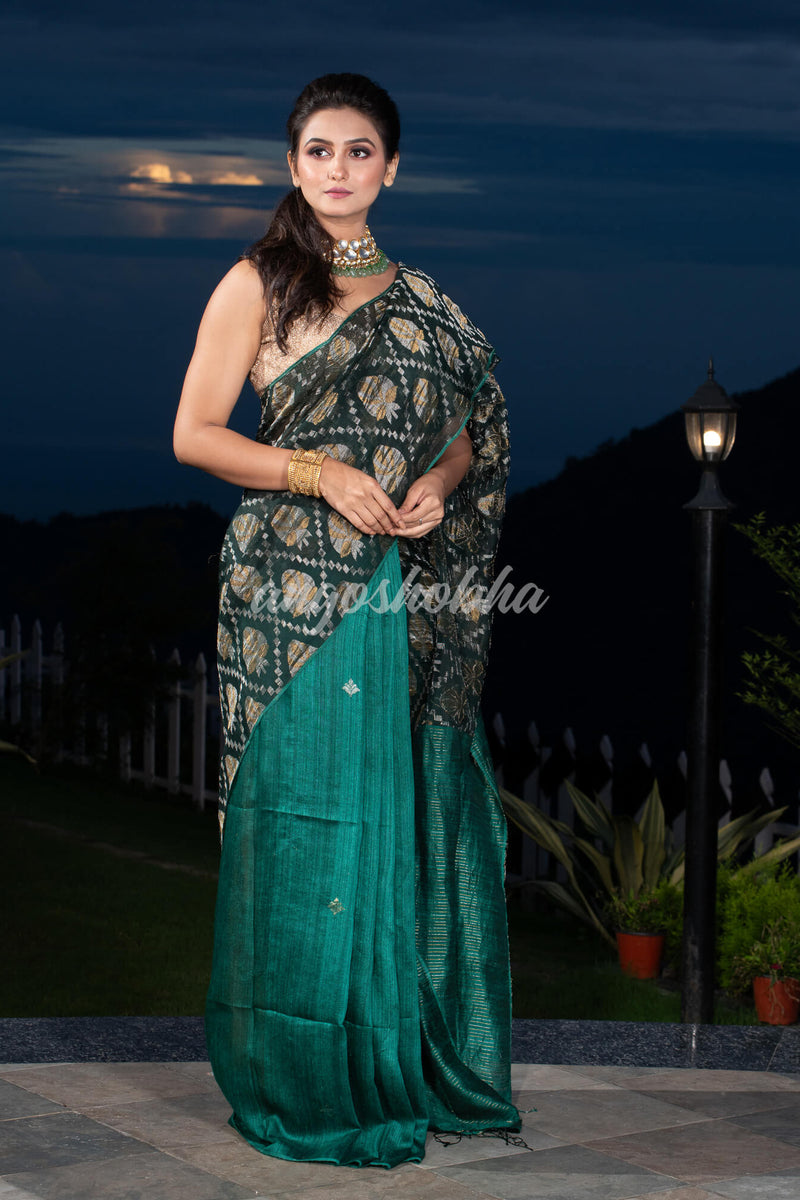 Dark Green Silk Matka Body with Leaves Intricate Design including Silver & Golden Stripes on Check Pallu Handwoven Saree
