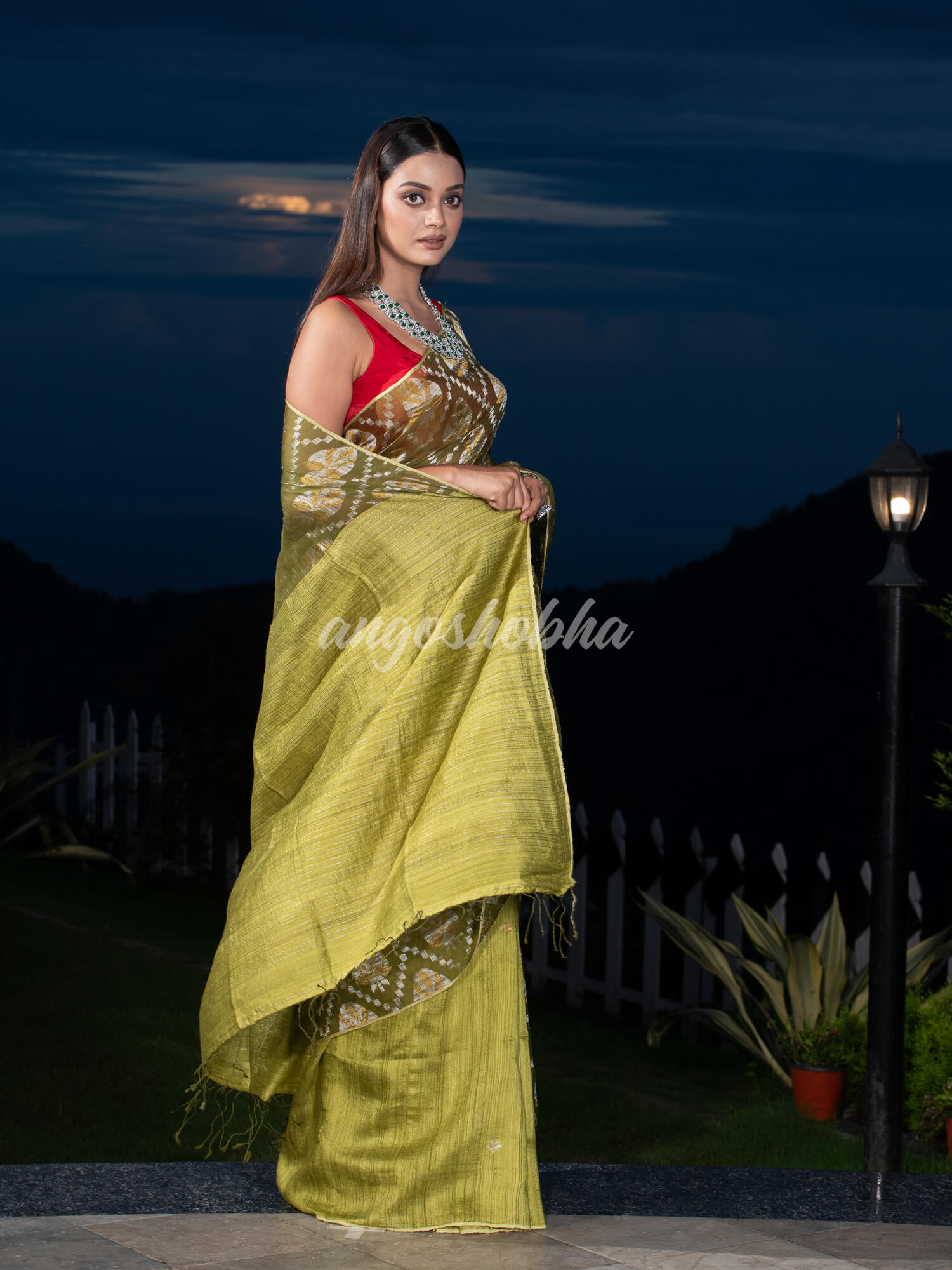 Olive Green Silk Matka Body with Leaves Intricate Design including Silver & Golden Stripes on Check Pallu Handwoven Saree