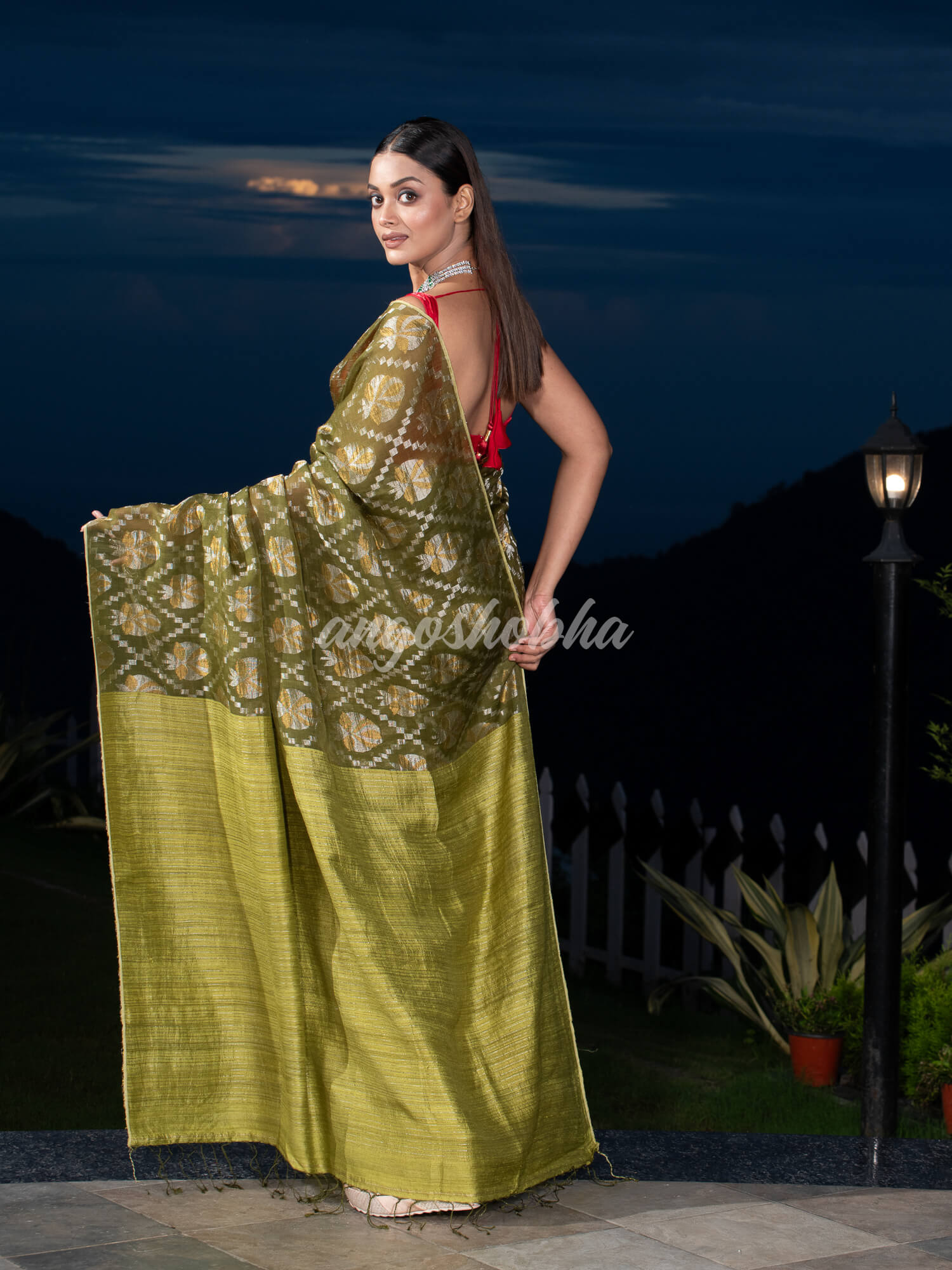 Olive Green Silk Matka Body with Leaves Intricate Design including Silver & Golden Stripes on Check Pallu Handwoven Saree