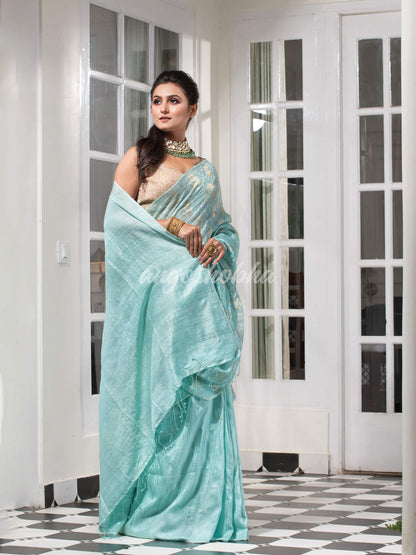 Teal Silk Matka Body with Leaves Intricate Design including Silver & Golden Stripes on Check Pallu Handwoven Saree