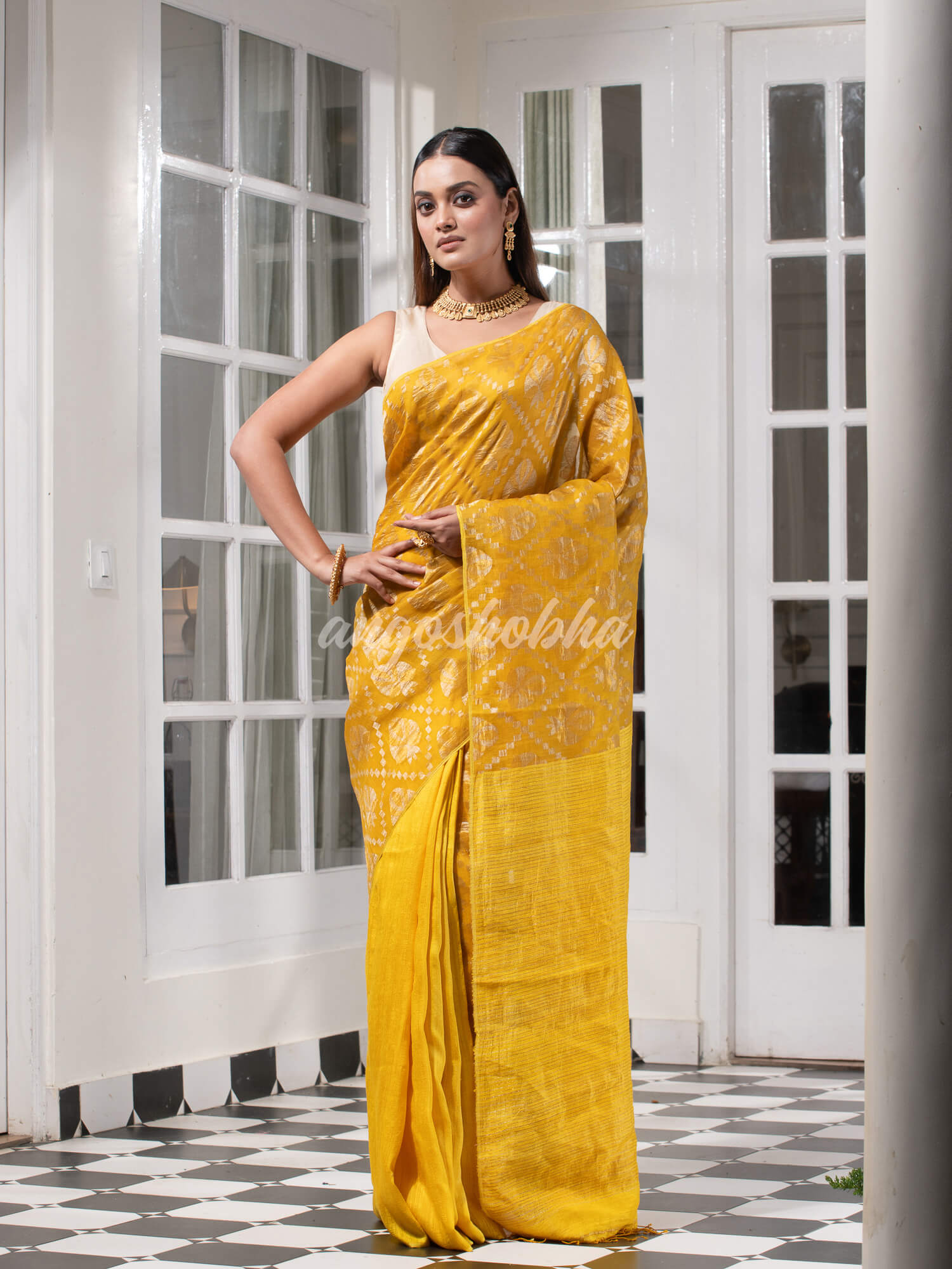 Yellow Silk Matka Body with Leaves Intricate Design including Silver & Golden Stripes on Check Pallu Handwoven Saree