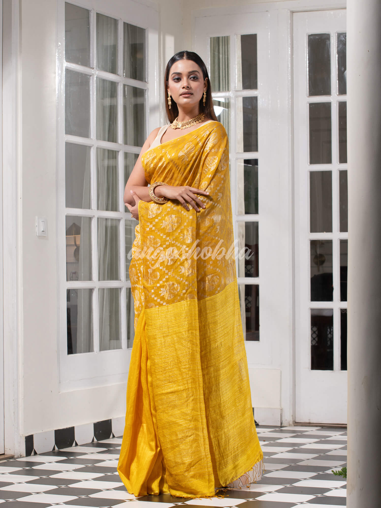 Yellow Silk Matka Body with Leaves Intricate Design including Silver & Golden Stripes on Check Pallu Handwoven Saree