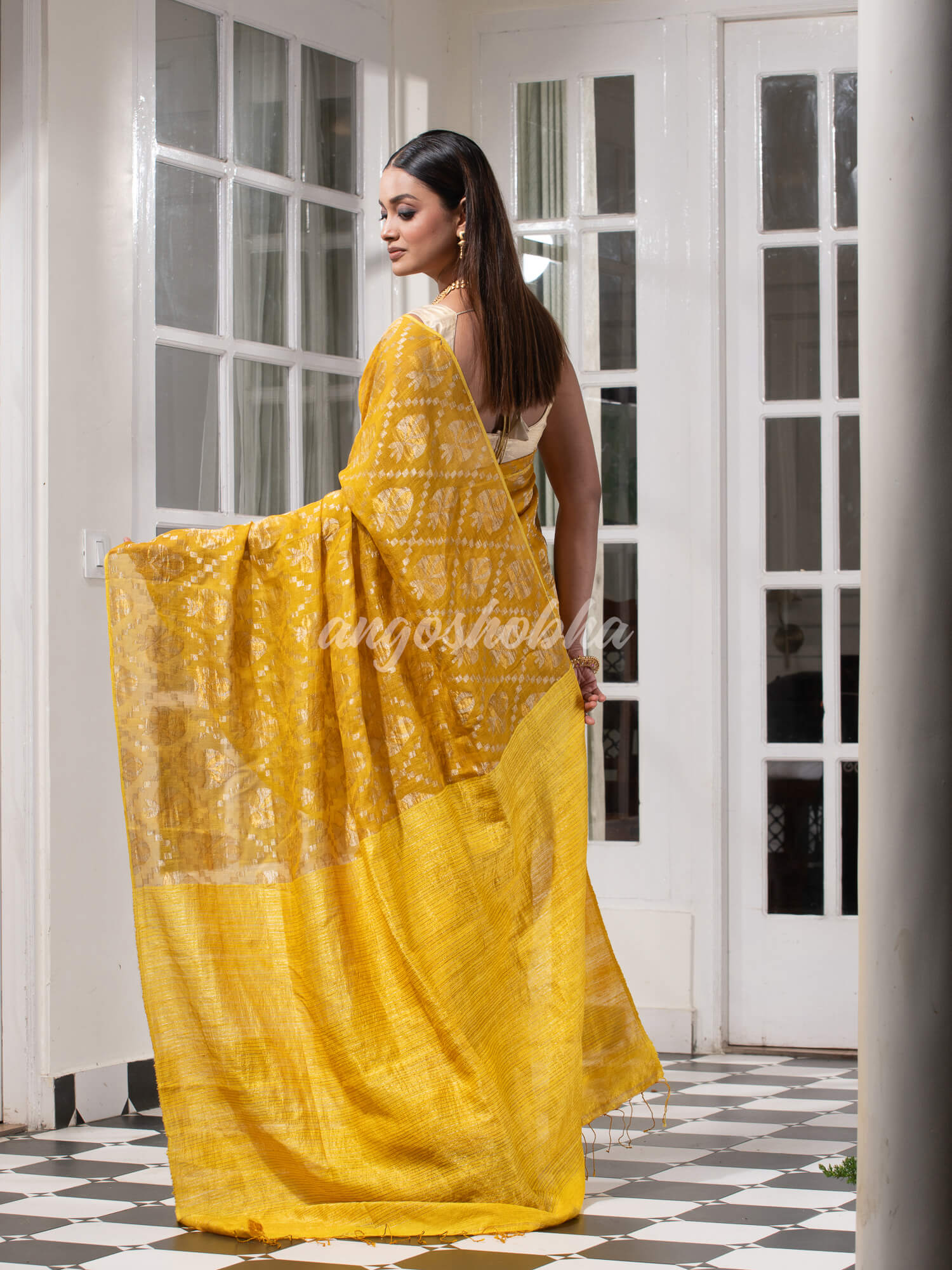 Yellow Silk Matka Body with Leaves Intricate Design including Silver & Golden Stripes on Check Pallu Handwoven Saree
