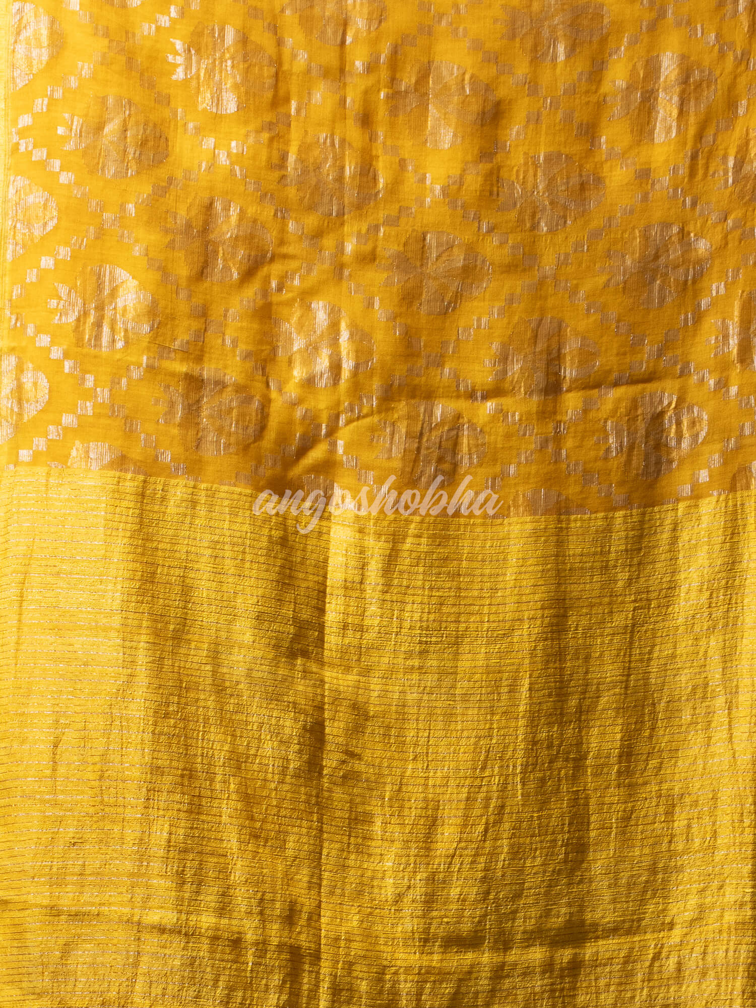 Yellow Silk Matka Body with Leaves Intricate Design including Silver & Golden Stripes on Check Pallu Handwoven Saree