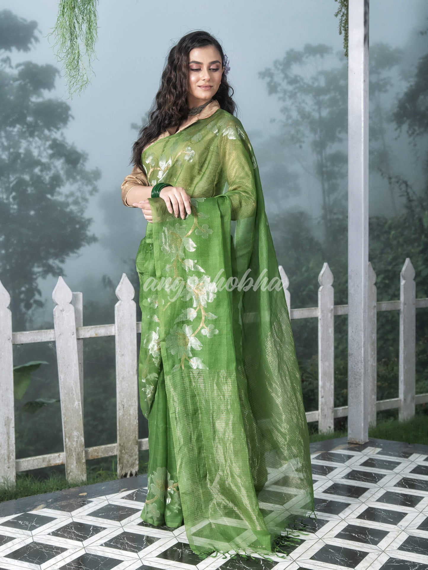 Green Silk White Flowers Motive Handwoven Muslin Saree