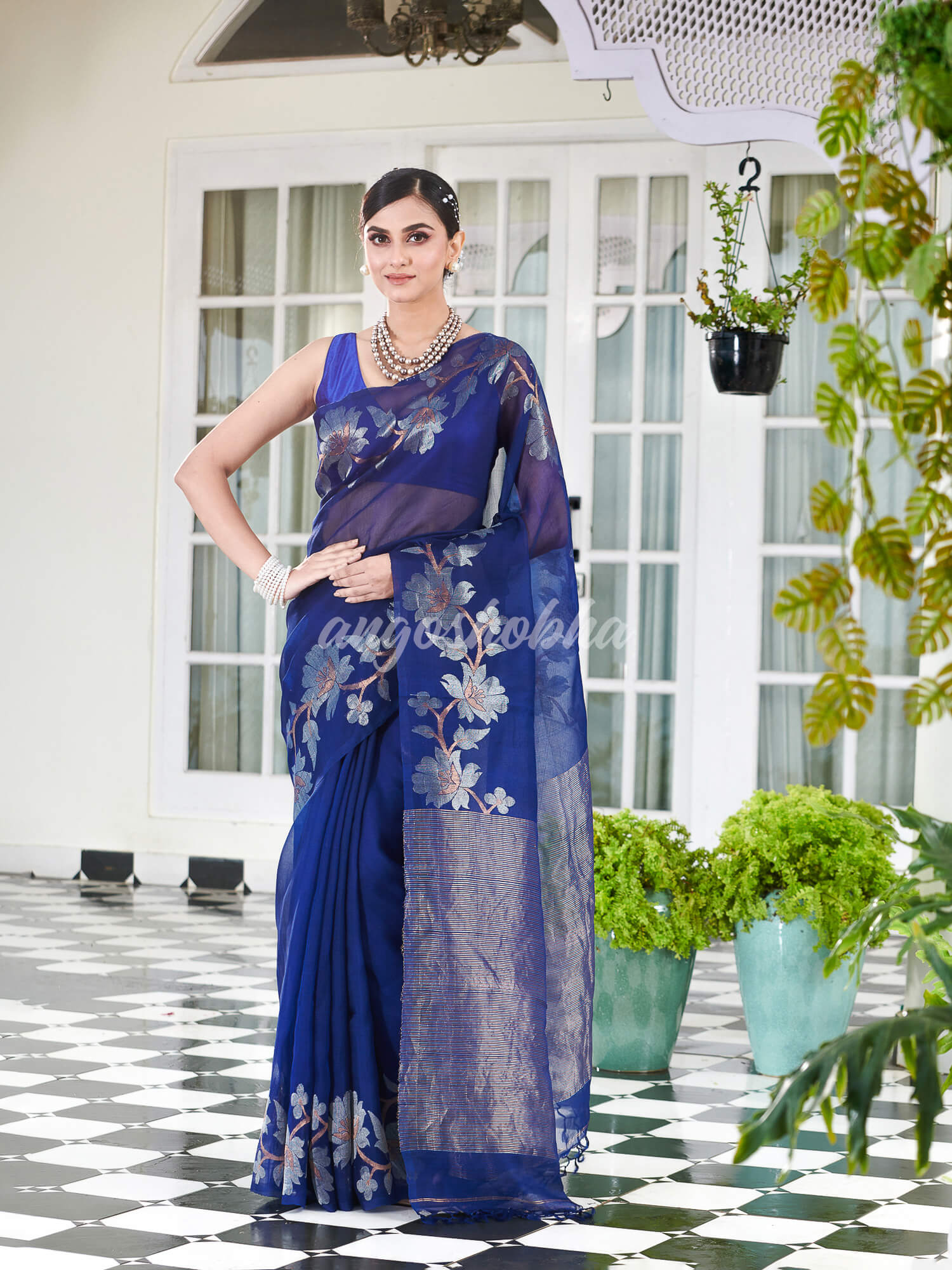 Blue Silk White Flowers Motive Handwoven Muslin Saree