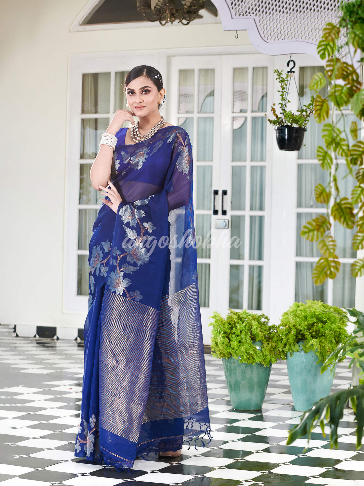 Blue Silk White Flowers Motive Handwoven Muslin Saree