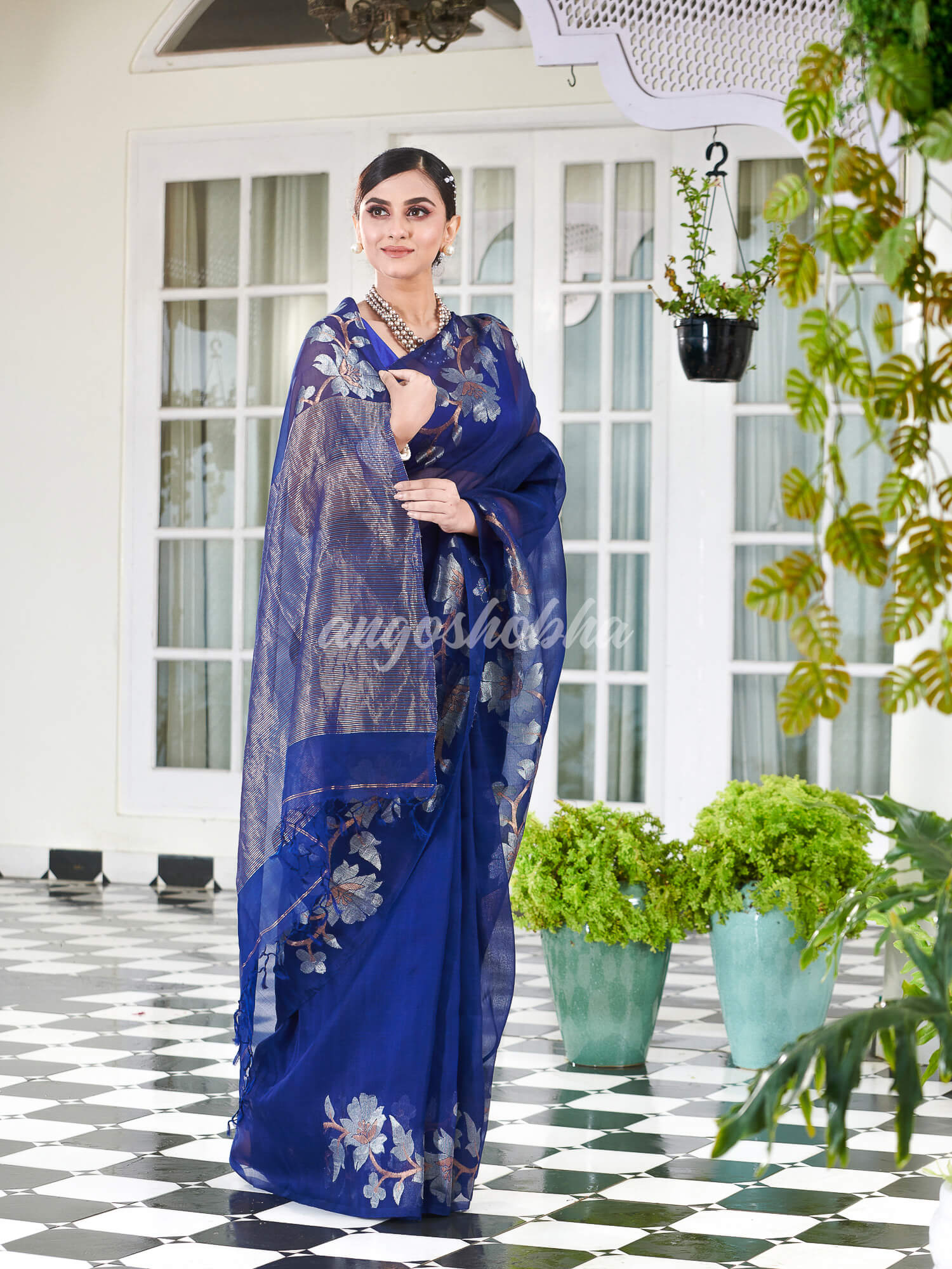 Blue Silk White Flowers Motive Handwoven Muslin Saree