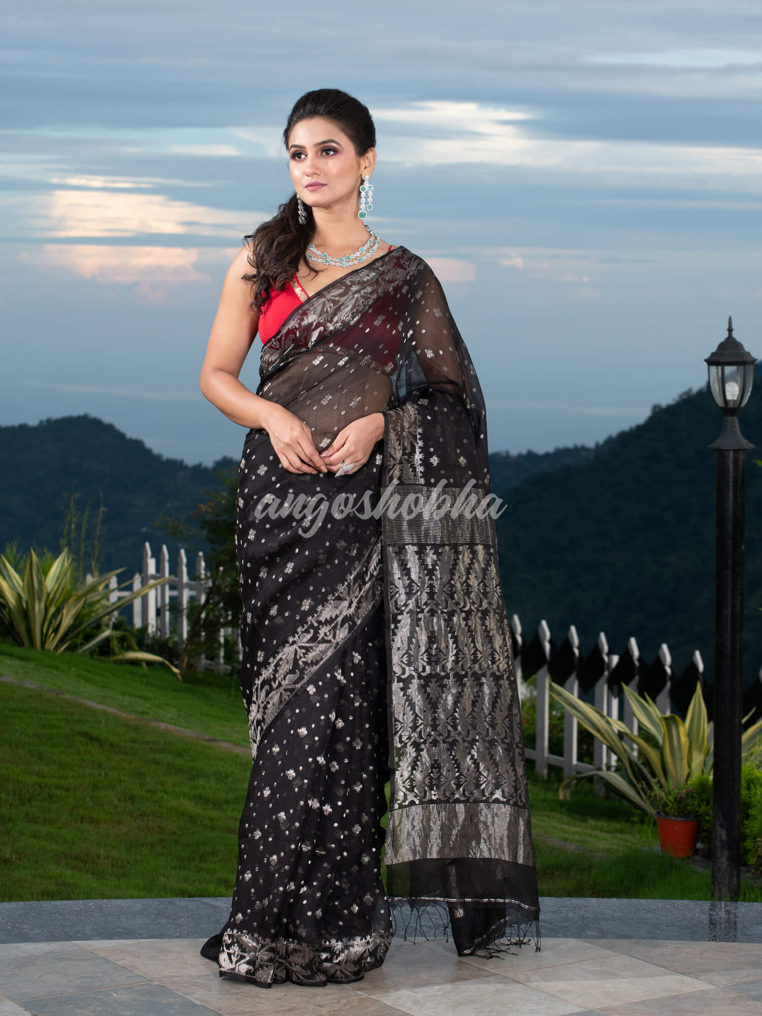 Black Silk Muslin Body and The Hem with Intricate Silver Motifs Design  Handwoven Saree