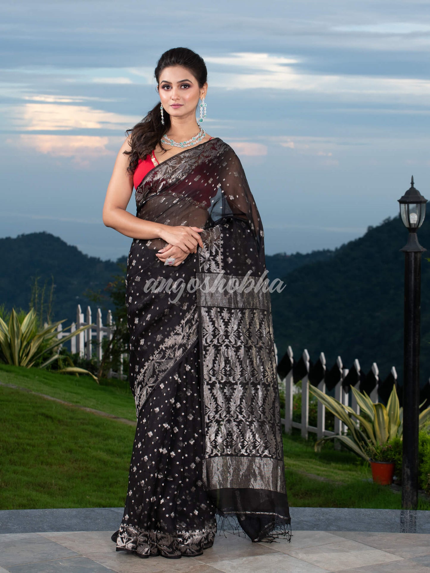 Black Silk Muslin Body and The Hem with Intricate Silver Motifs Design  Handwoven Saree