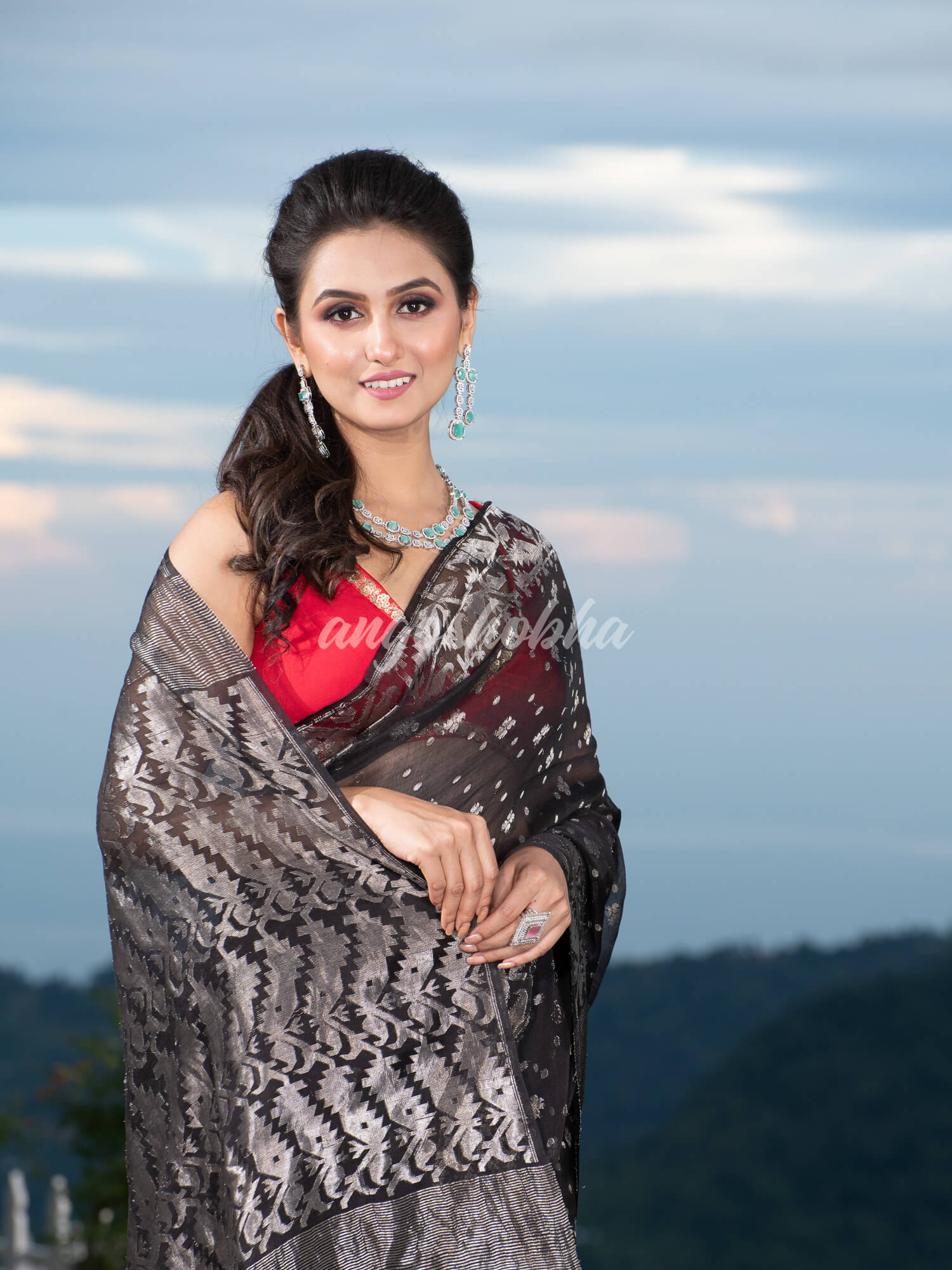 Black Silk Muslin Body and The Hem with Intricate Silver Motifs Design  Handwoven Saree