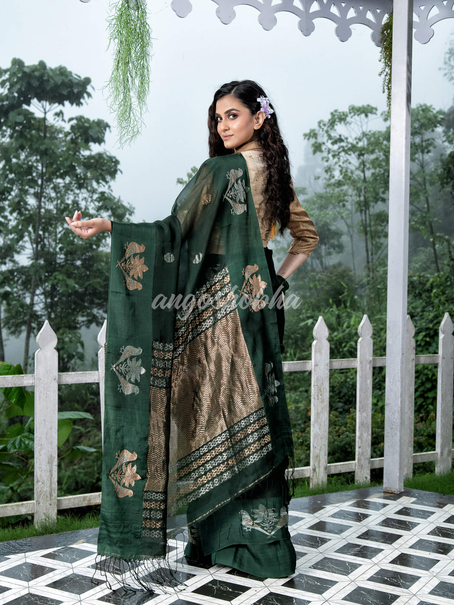 Moss Green Pure Muslin Intricate Bird Design Border Handwoven Saree