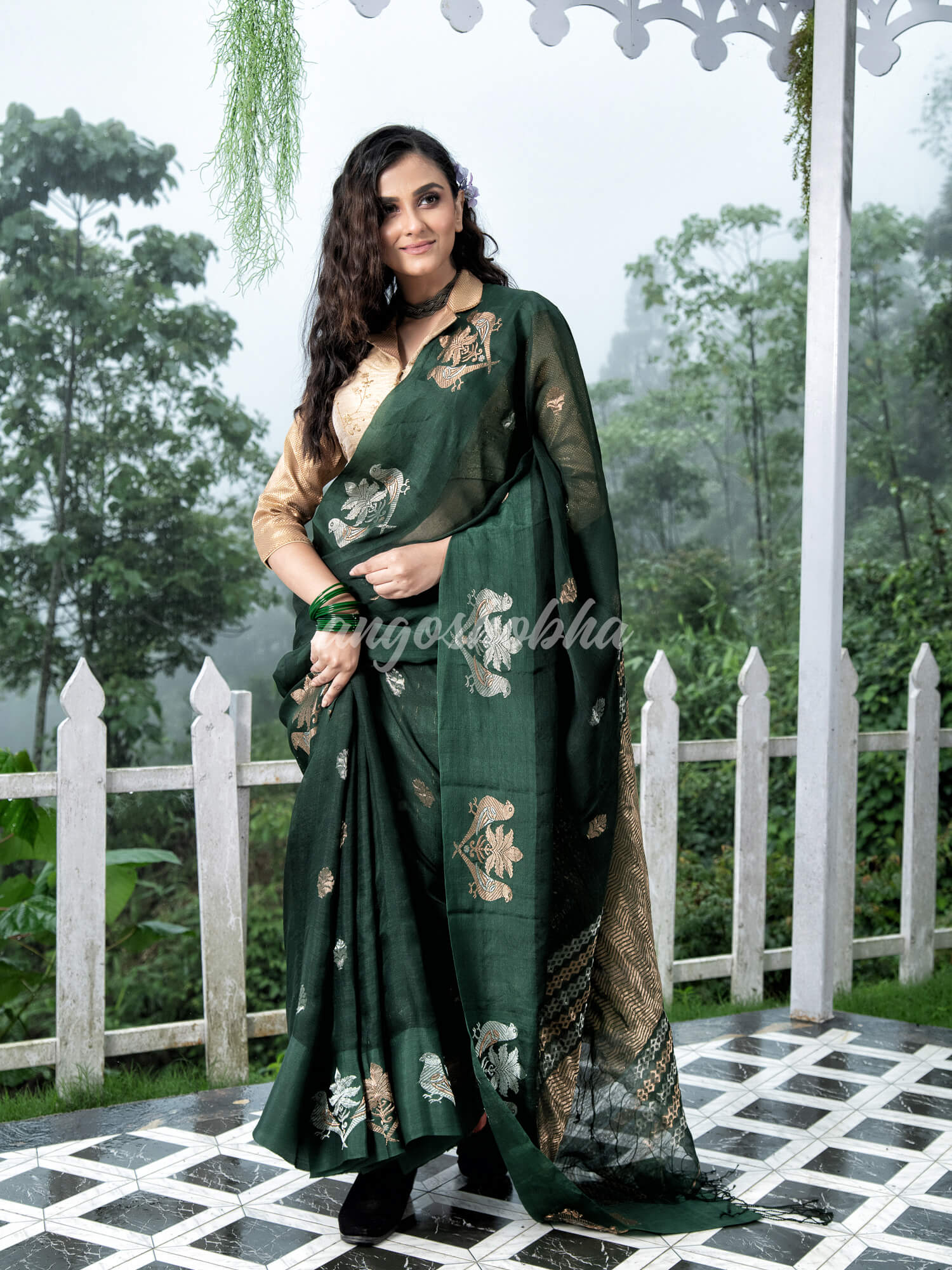 Moss Green Pure Muslin Intricate Bird Design Border Handwoven Saree