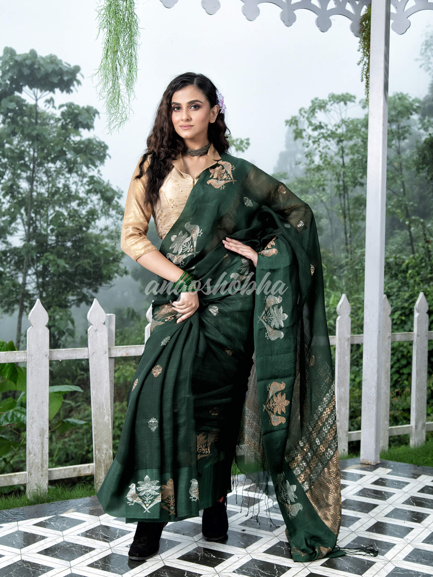 Moss Green Pure Muslin Intricate Bird Design Border Handwoven Saree