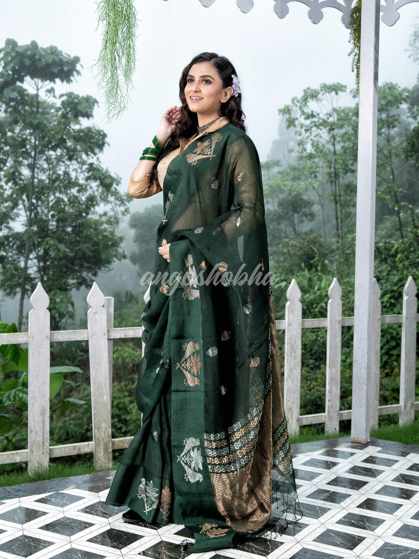 Moss Green Pure Muslin Intricate Bird Design Border Handwoven Saree