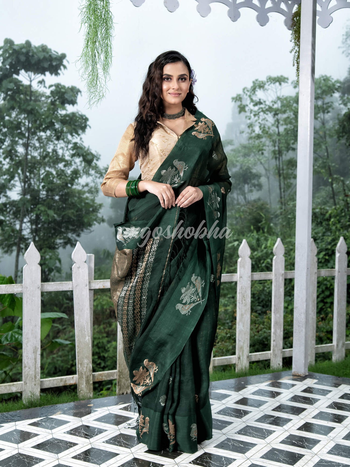 Moss Green Pure Muslin Intricate Bird Design Border Handwoven Saree