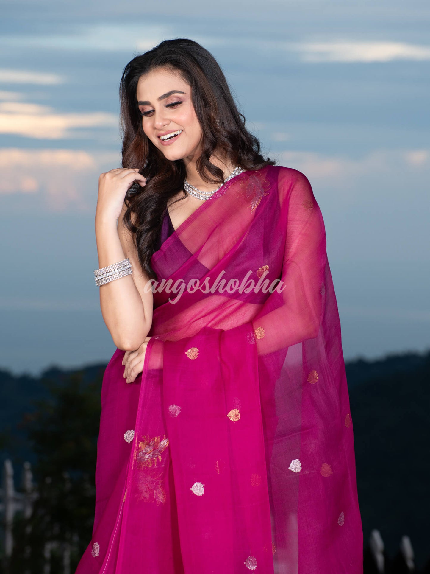 Magenta Pure Muslin Silk Leaf Motifs Textured Handwoven Saree