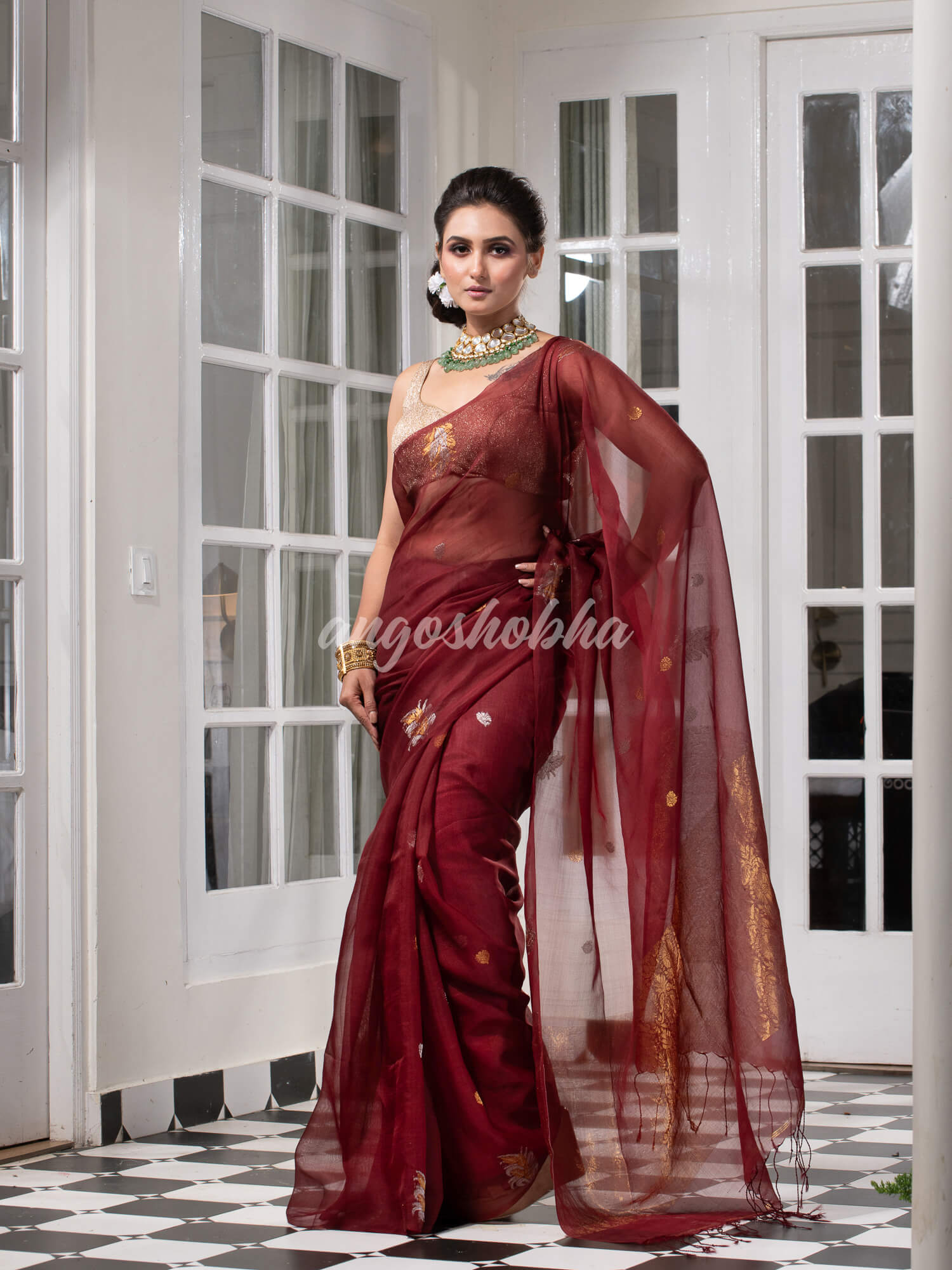 Burgundy Pure Muslin Silk Leaf Motifs Textured Handwoven Saree