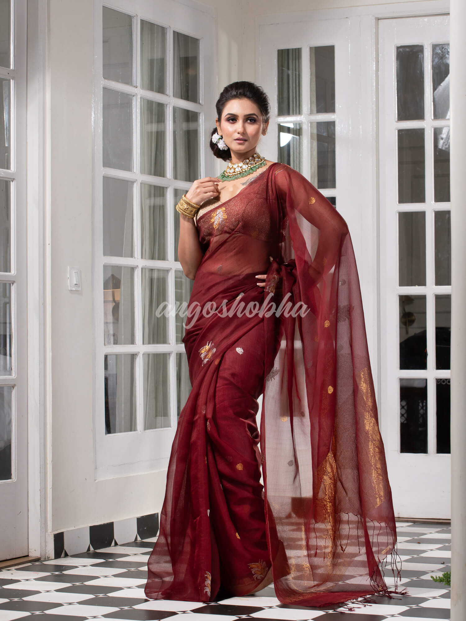 Burgundy Pure Muslin Silk Leaf Motifs Textured Handwoven Saree