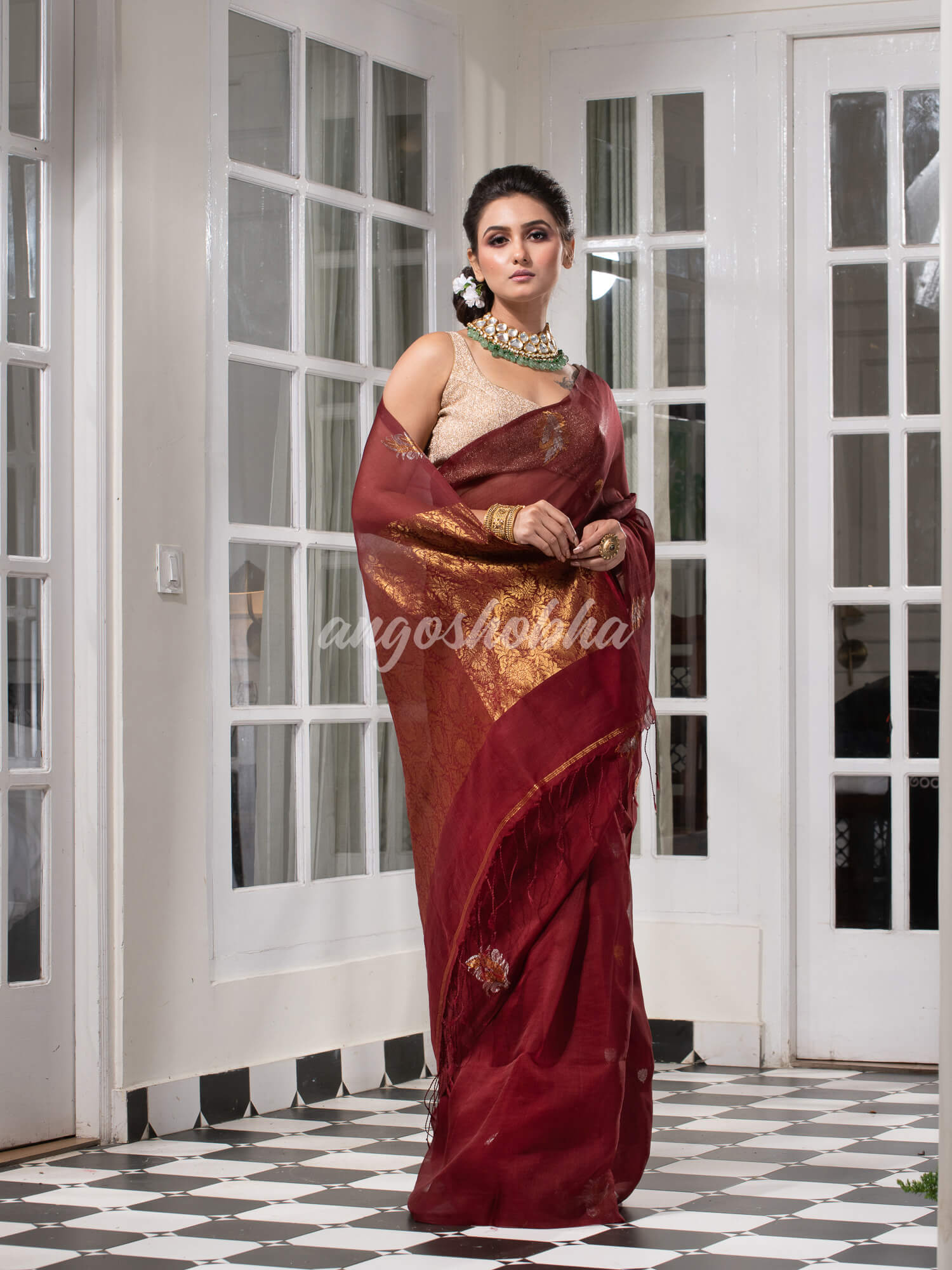 Burgundy Pure Muslin Silk Leaf Motifs Textured Handwoven Saree