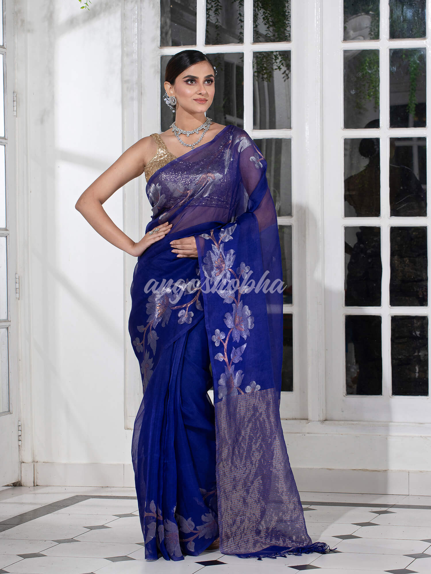 Blue Silk White Flowers Motive Handwoven Muslin Saree