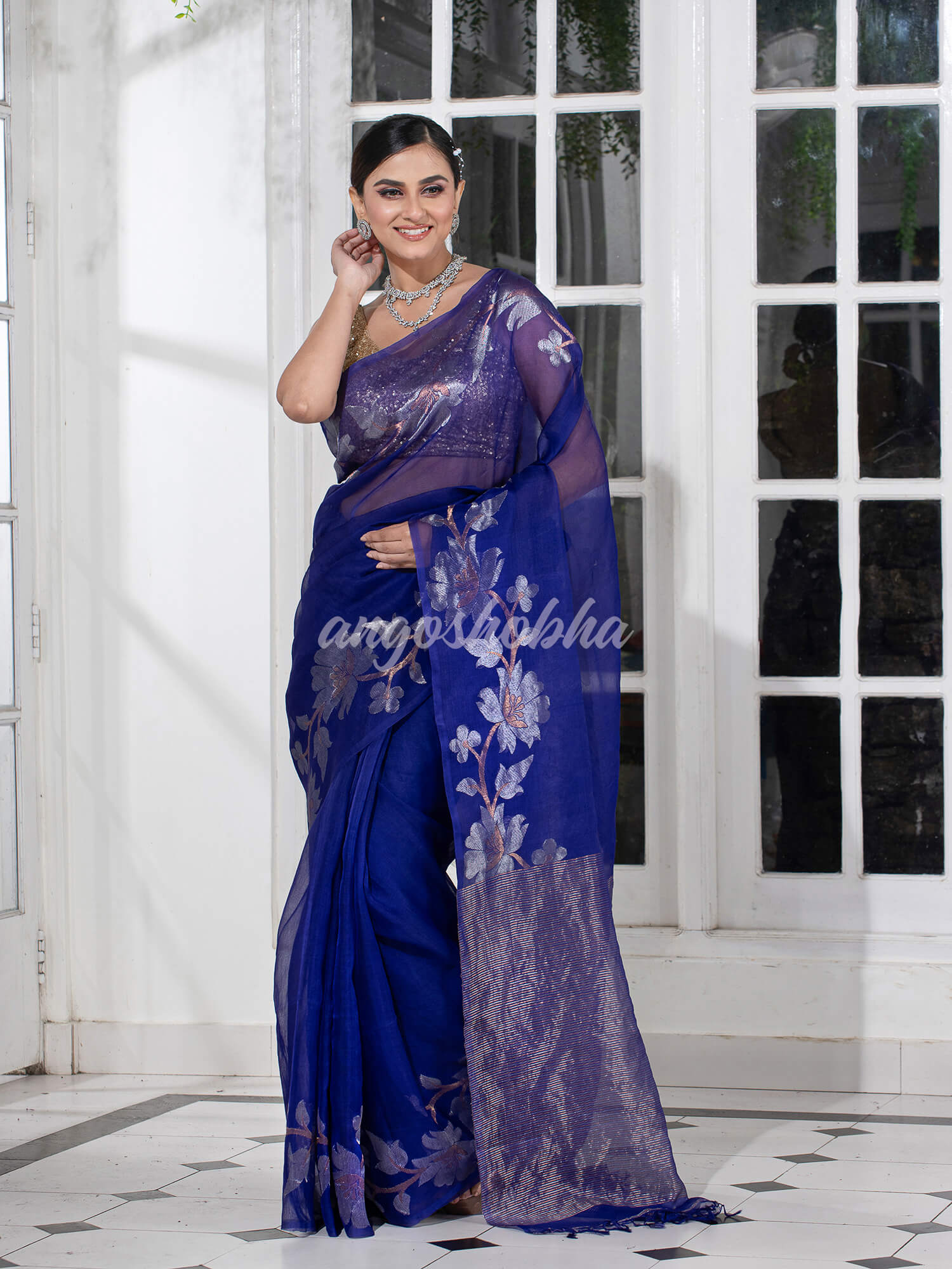 Blue Silk White Flowers Motive Handwoven Muslin Saree