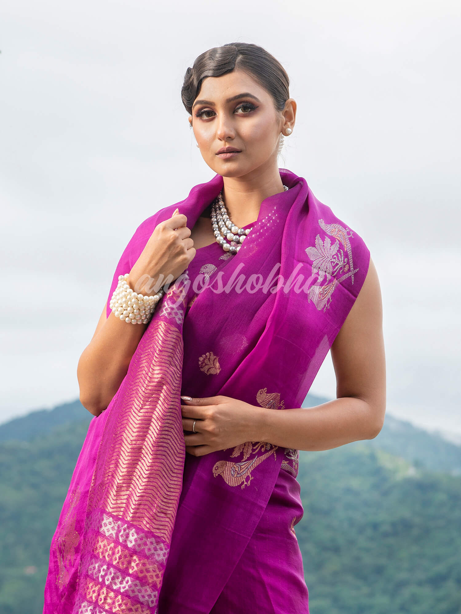 Magenta Pure Muslin Intricate Bird Design Border Handwoven Saree