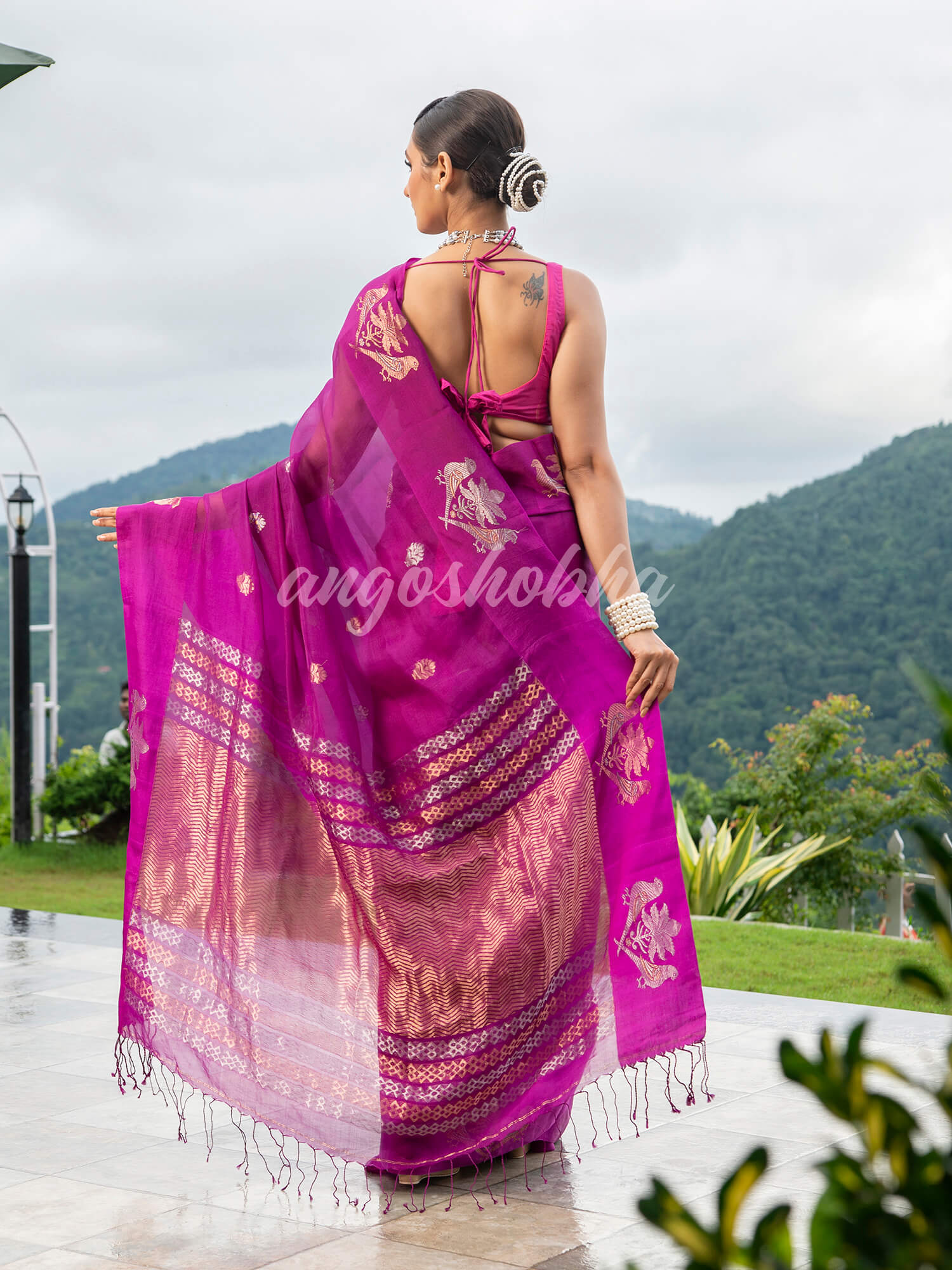 Magenta Pure Muslin Intricate Bird Design Border Handwoven Saree